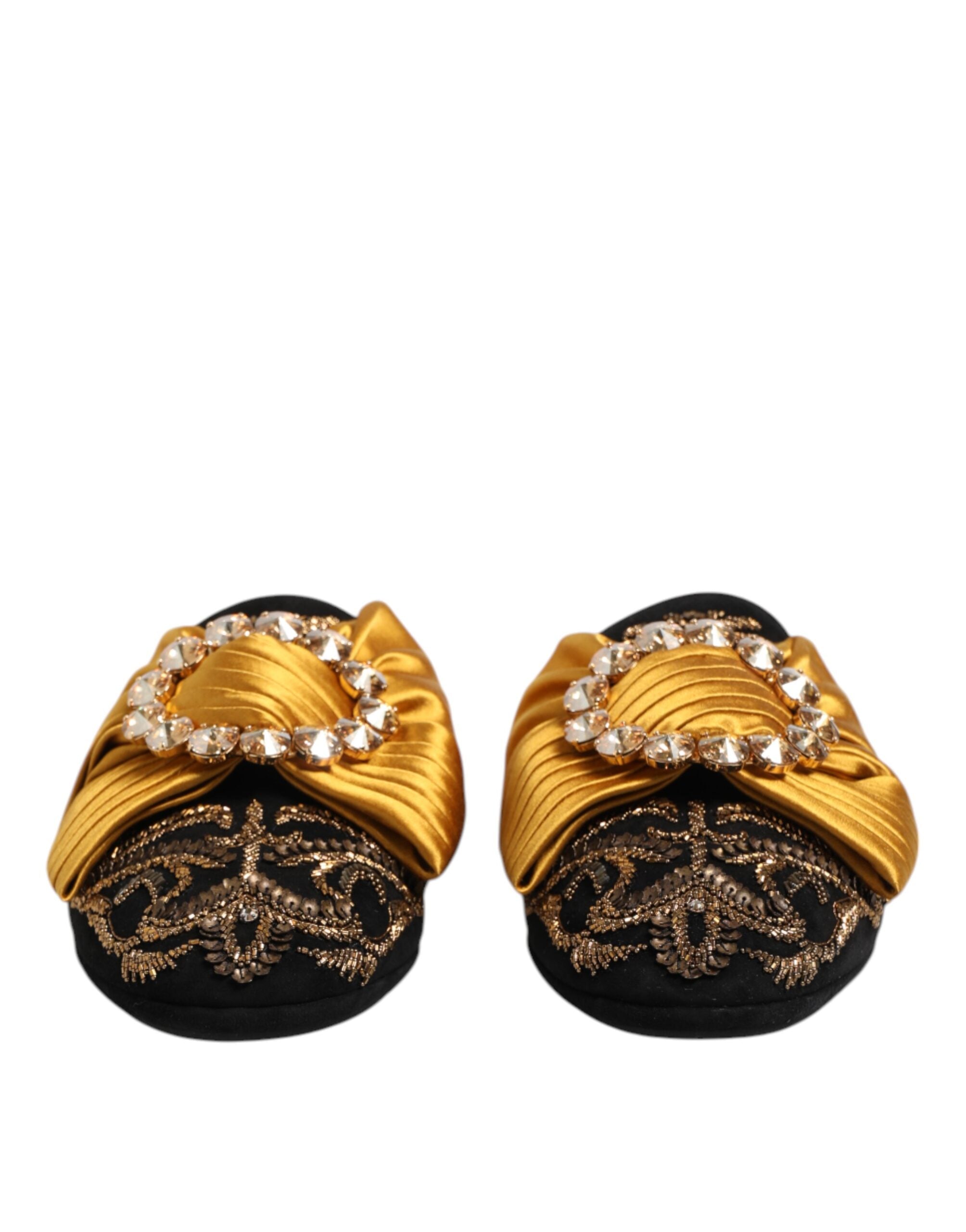 Sandales plates Dolce & Gabbana multicolores ornées de pierres, chaussures élégantes et confortables pour un style sophistiqué.