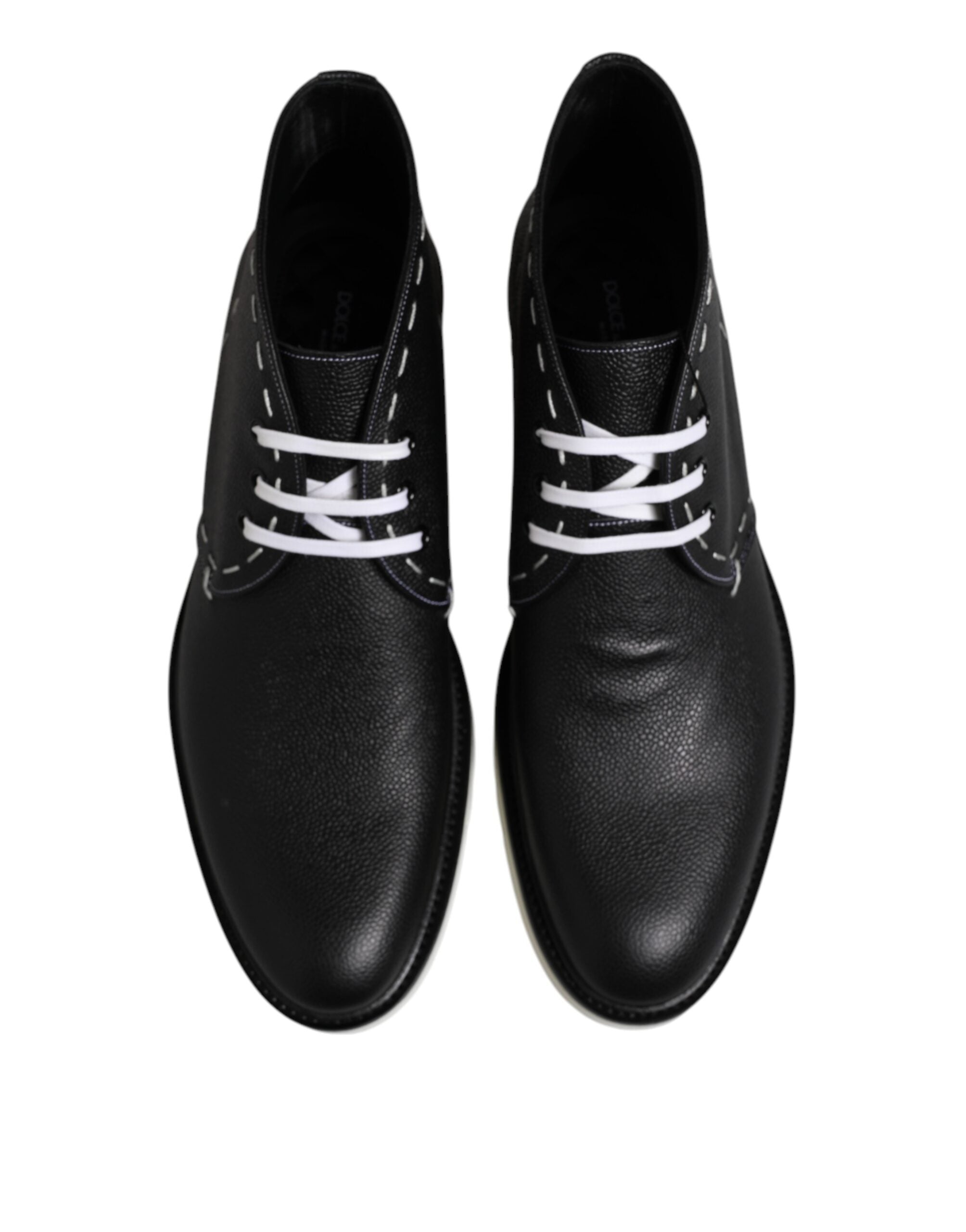 Bottes ankle en cuir noir et blanc Dolce & Gabbana, chaussures élégantes pour femmes, vue en gros plan.