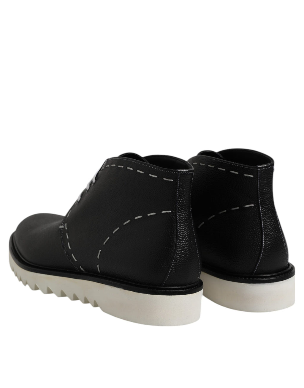 Bottes ankle en cuir noir et blanc Dolce & Gabbana, chaussures élégantes pour femme, vue de côté.