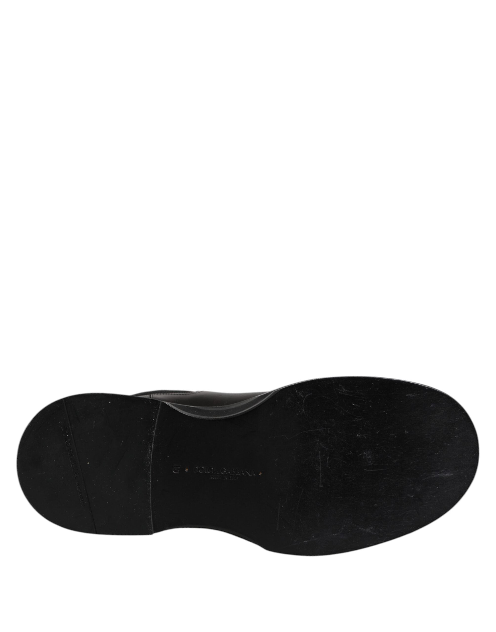 Bottes plates en cuir noir Dolce & Gabbana mi-mollet, chaussures élégantes pour femme, style classique et sophistiqué.