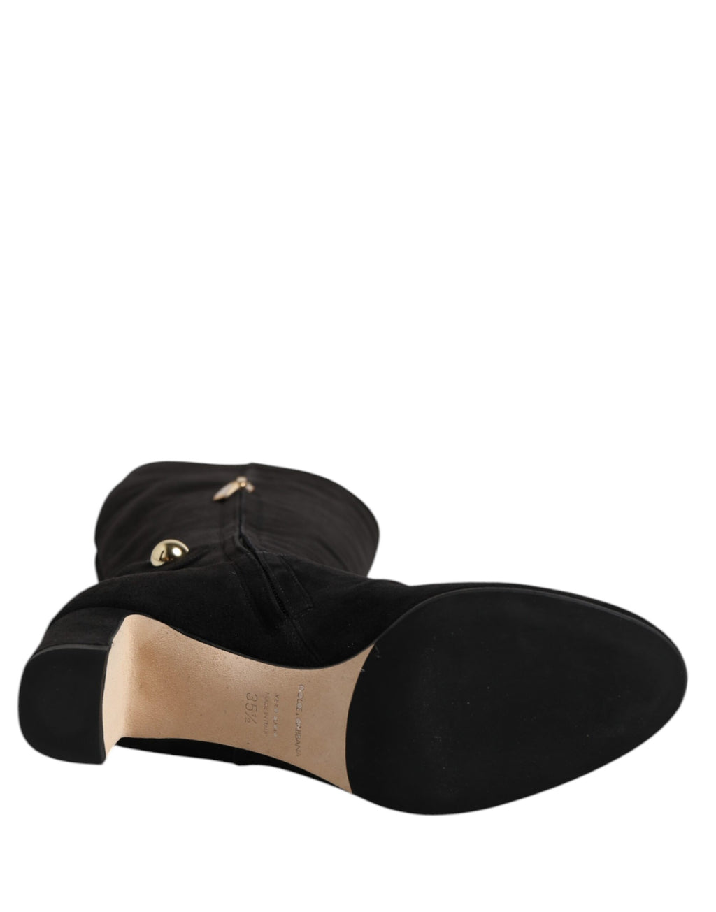 Bottes en cuir suédé noir Dolce & Gabbana, hautes jusqu'au genou, avec design élégant et finition sophistiquée.
