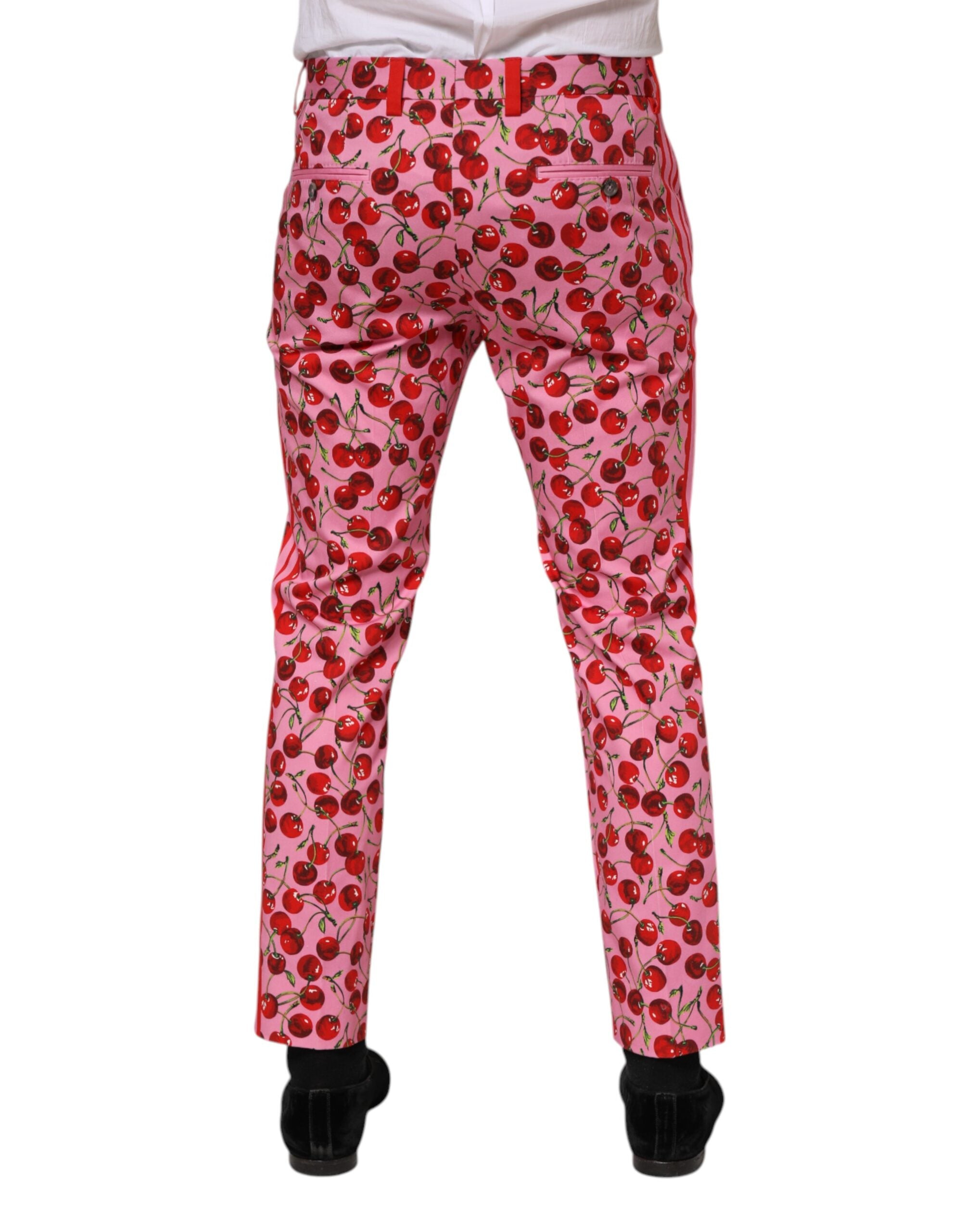 Pantalon en coton rose à imprimé cerise Dolce & Gabbana, style élégant et décontracté, vue de face sur fond neutre.