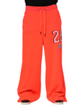 Pantalon jogging pour homme Dolce & Gabbana en polyester orange, style décontracté avec ceinture élastique et poches latérales.