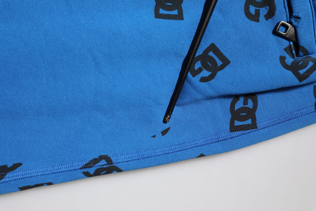 Pantalon jogger homme Dolce & Gabbana bleu avec logo imprimé, style décontracté et confortable, en tissu doux.