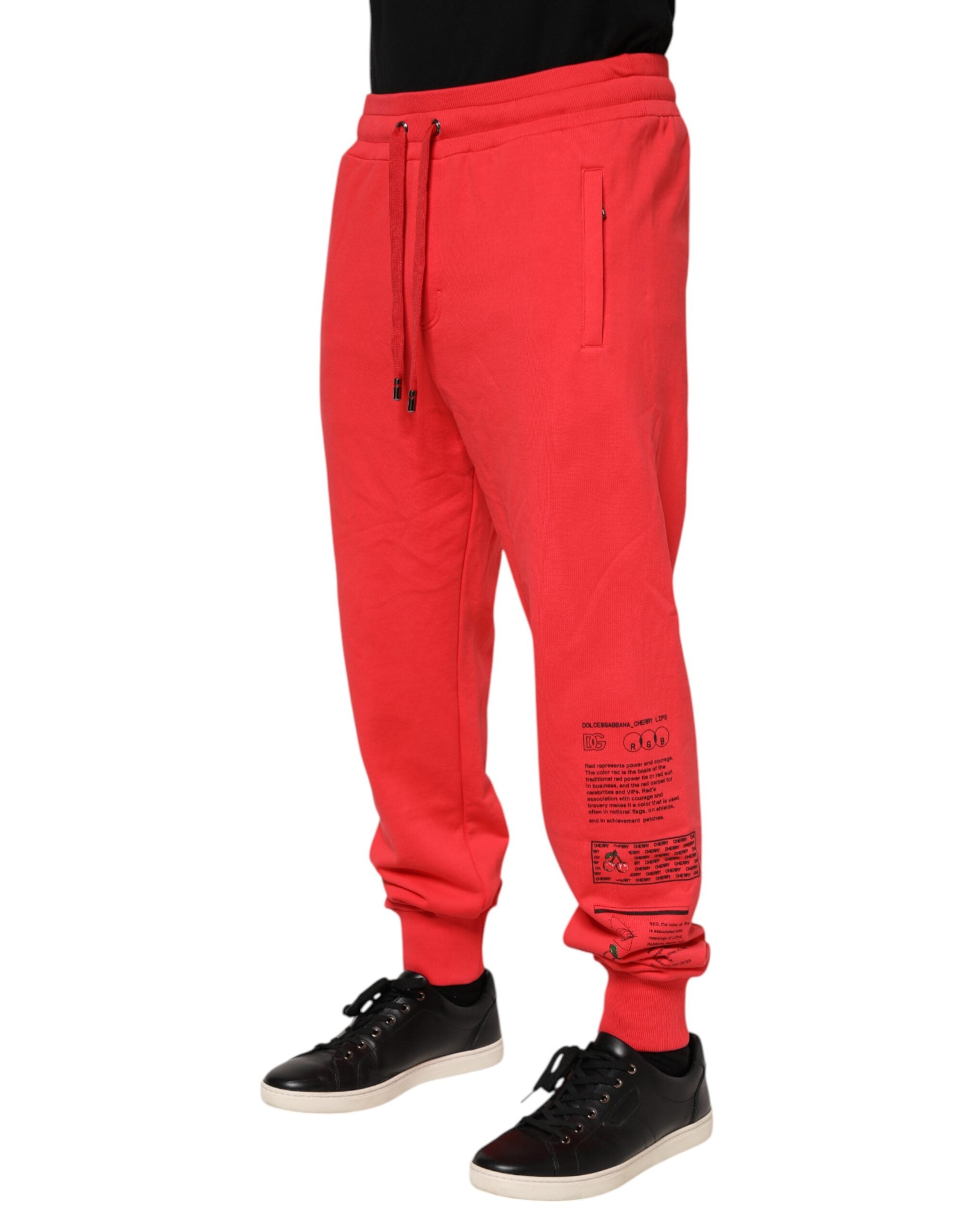 Pantalon jogger pour homme Dolce & Gabbana en coton rouge, style décontracté avec élastique à la taille et poches latérales.