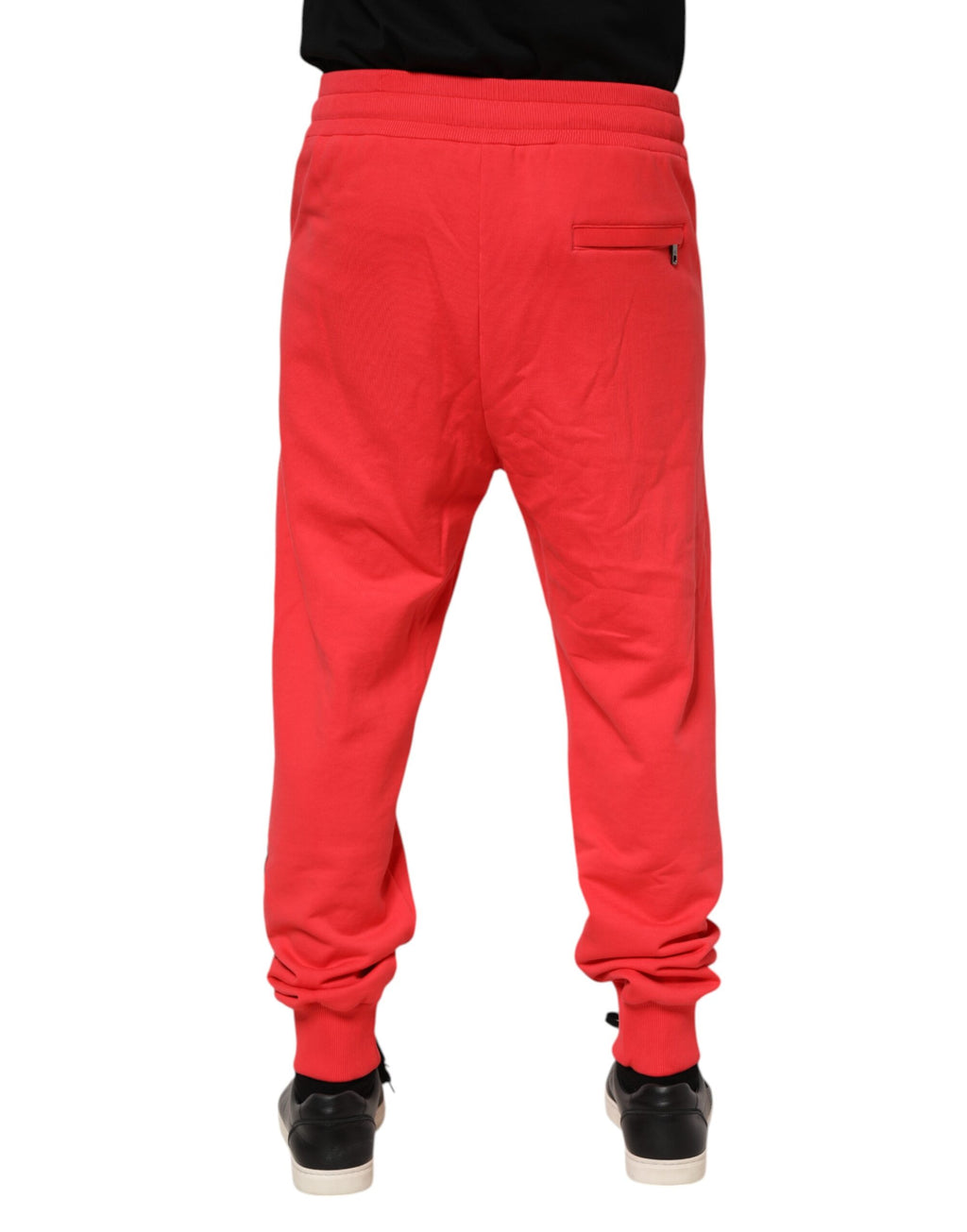 Pantalon jogging rouge en coton pour homme de Dolce & Gabbana, pantalon décontracté avec taille élastique et poches latérales.