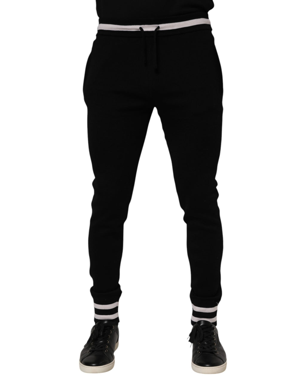 Pantalon jogger noir en coton pour homme de Dolce & Gabbana, pantalon décontracté avec ceinture élastique et poches latérales.