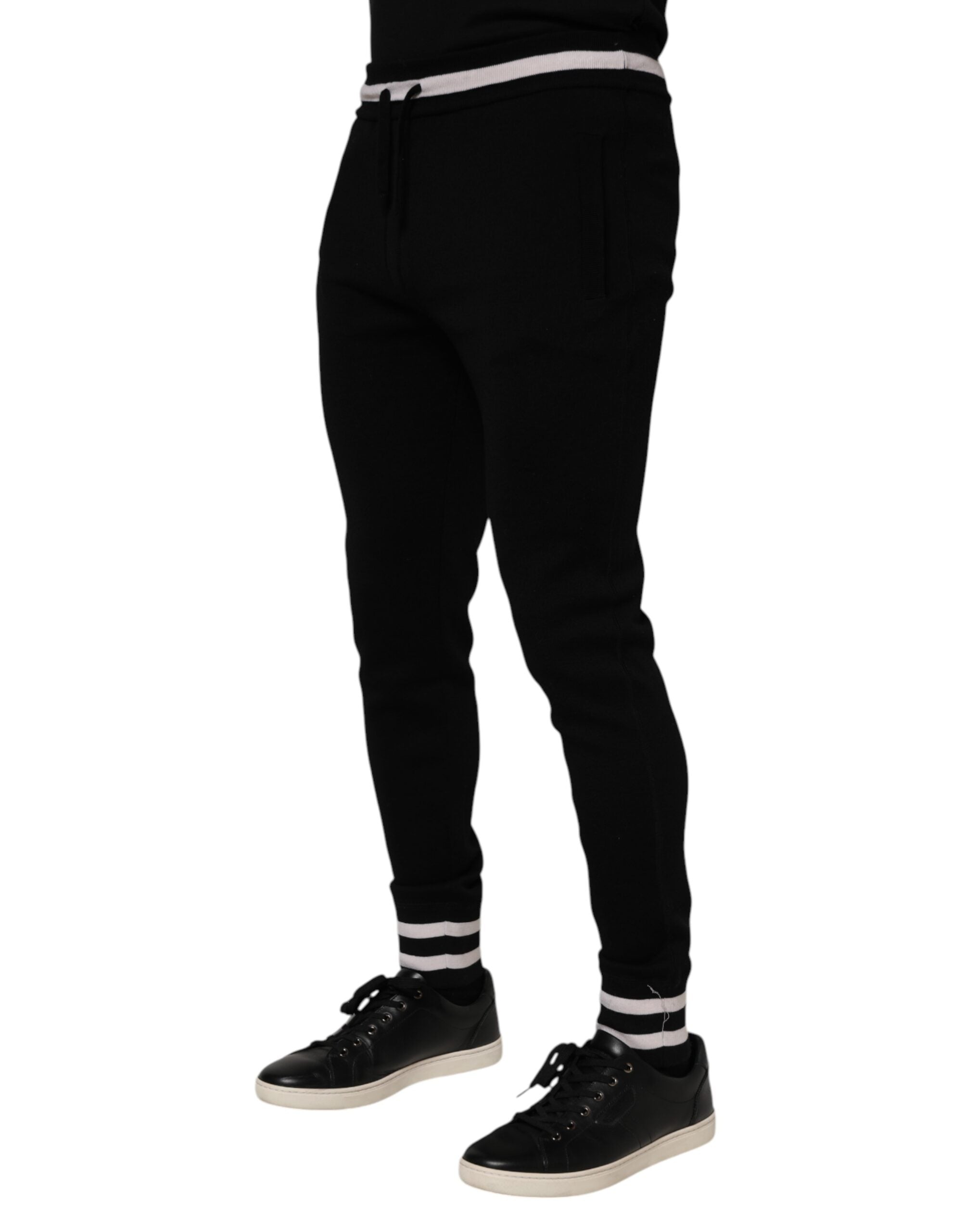 Pantalon jogger noir en coton pour homme de Dolce & Gabbana, style décontracté avec couture visible et taille élastique.