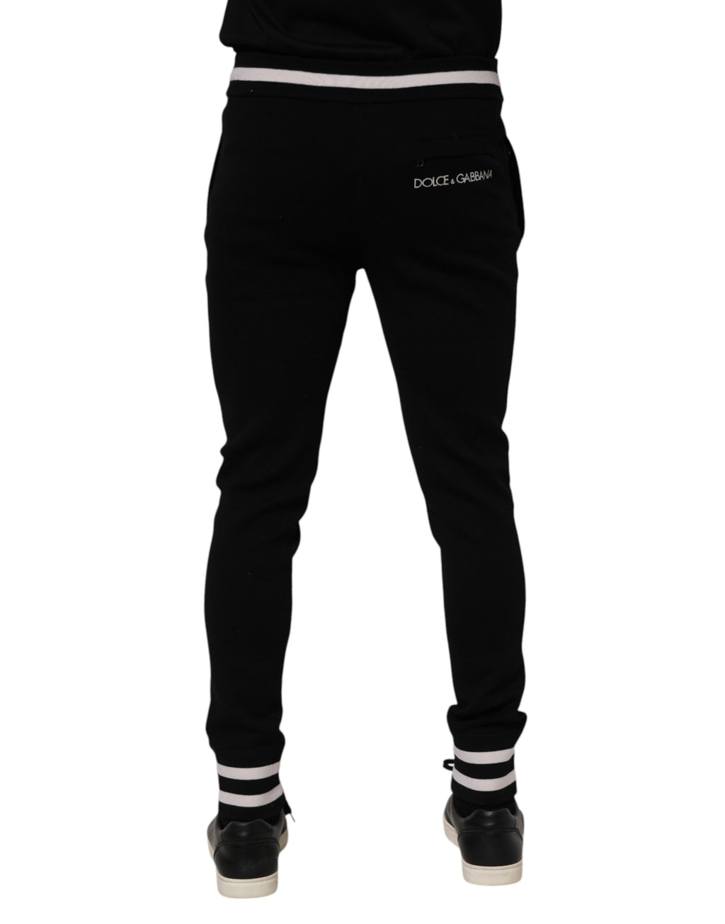 Pantalon jogger homme Dolce & Gabbana en coton noir, style décontracté avec ceinture élastique et poches latérales.
