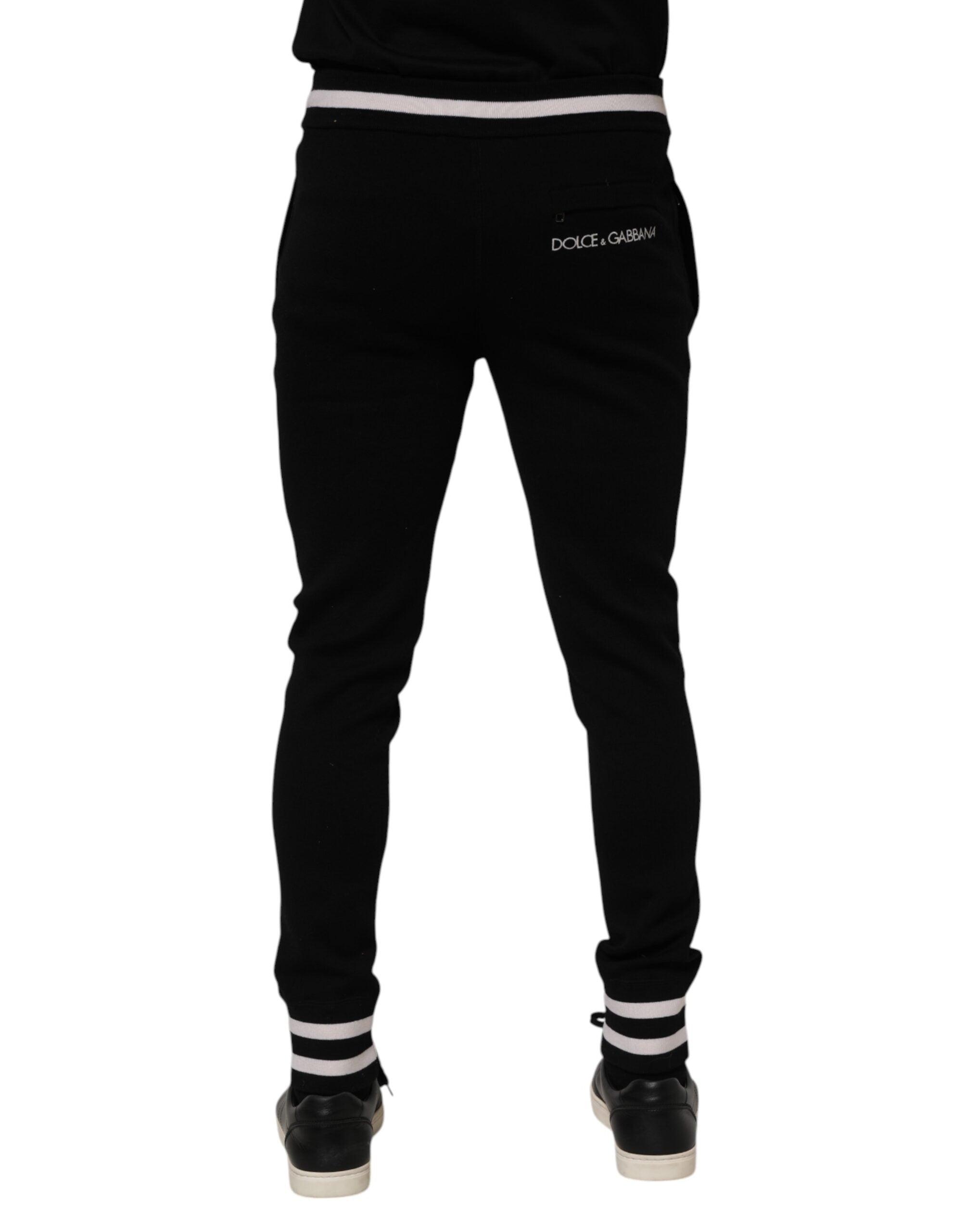 Pantalon jogger homme Dolce & Gabbana en coton noir, style décontracté avec ceinture élastique et poches latérales.