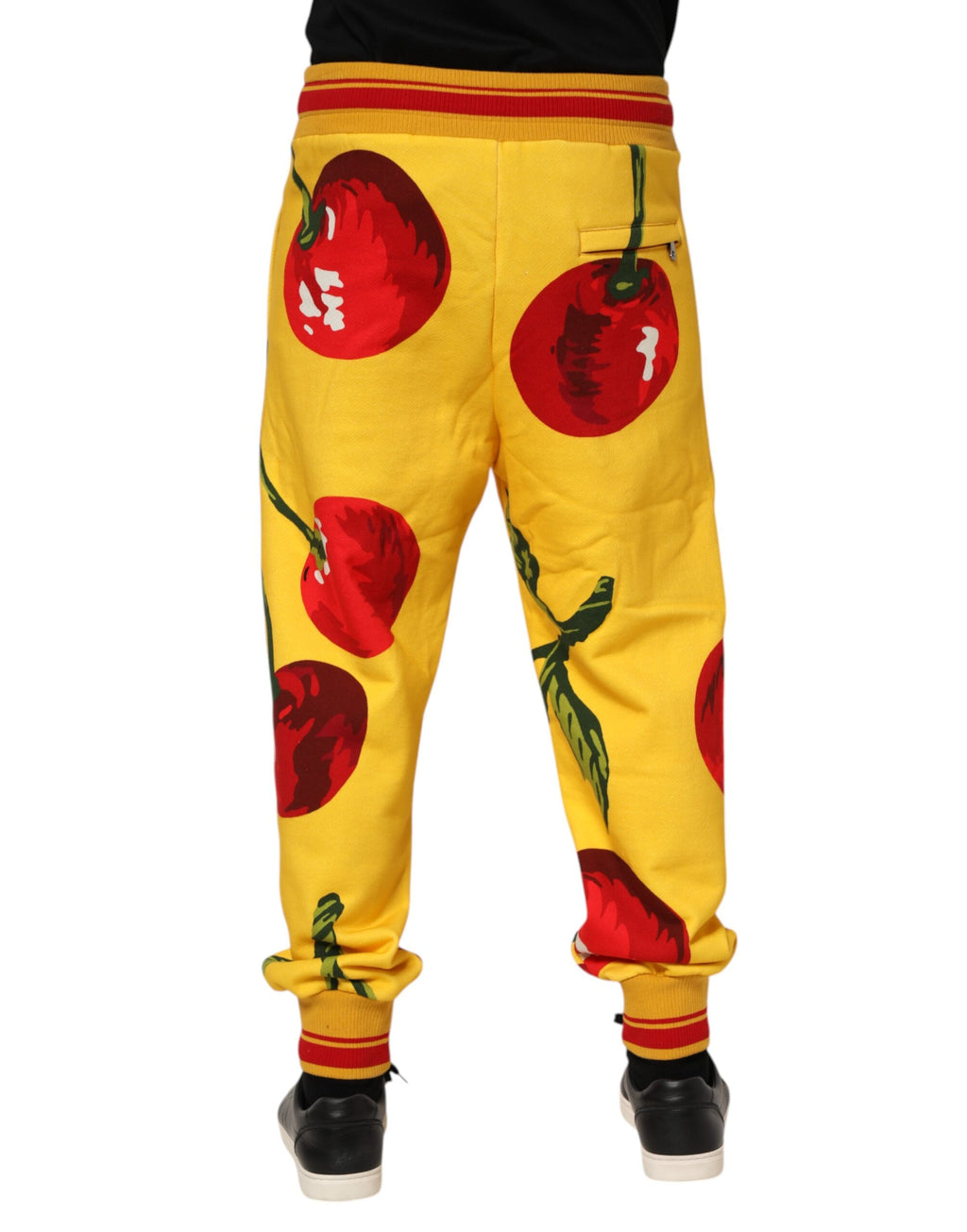 Pantalon de jogging Dolce & Gabbana à impressions de cerises jaunes, tissu confortable, style décontracté et tendance.