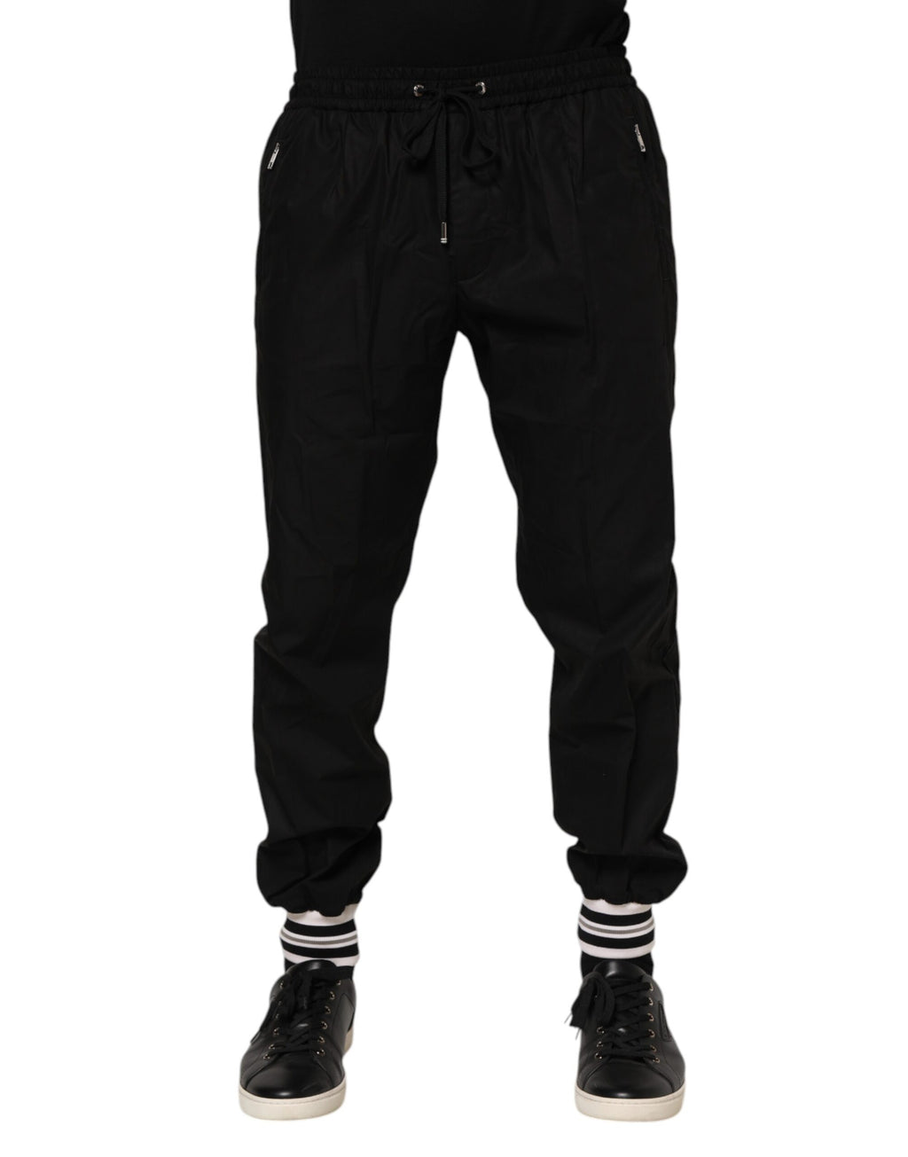Pantalons joggers pour homme Dolce & Gabbana en coton noir avec bande logo, tendance et confortables.