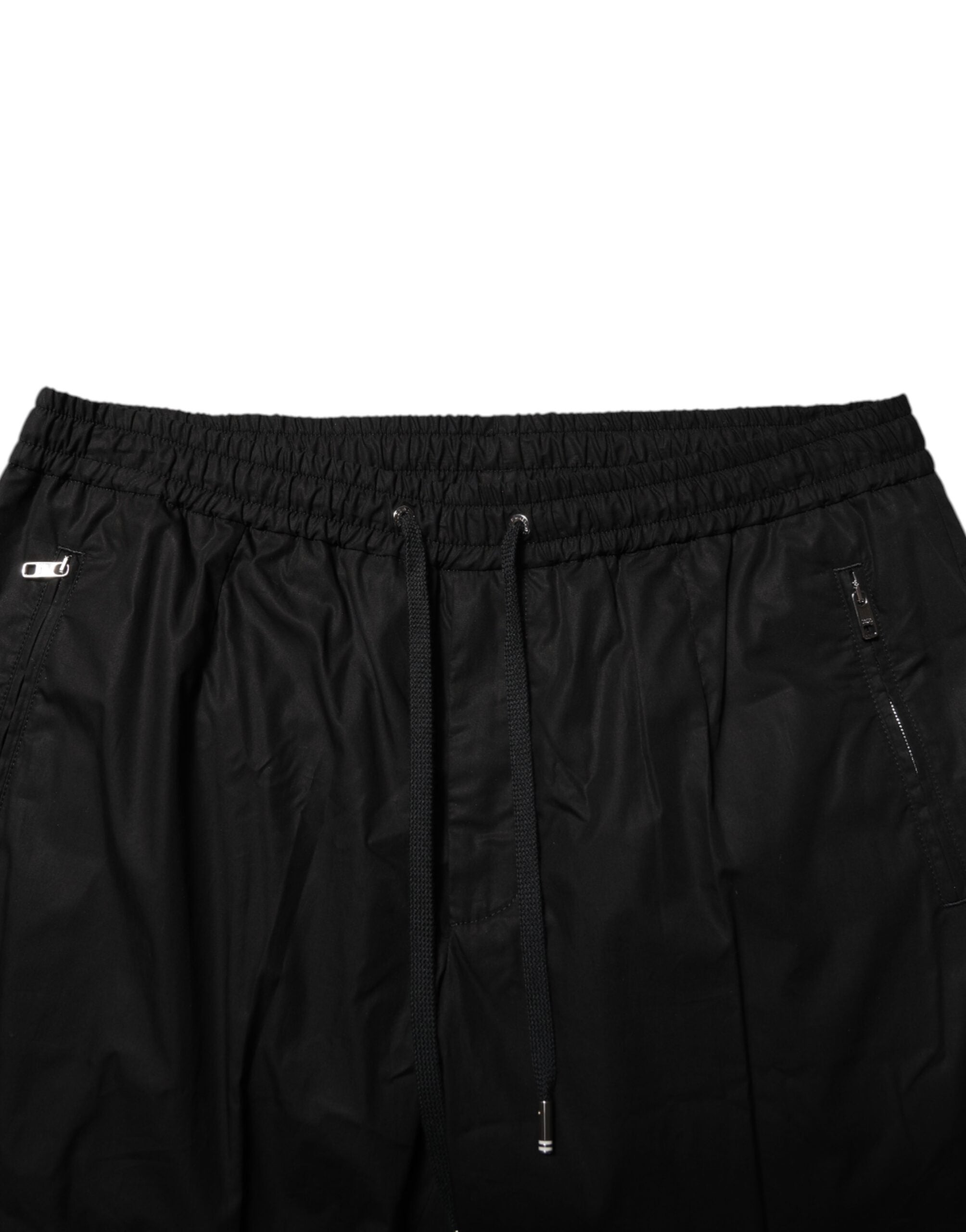 Pantalon jogger pour homme Dolce & Gabbana en coton noir avec bande logo, style décontracté et moderne.