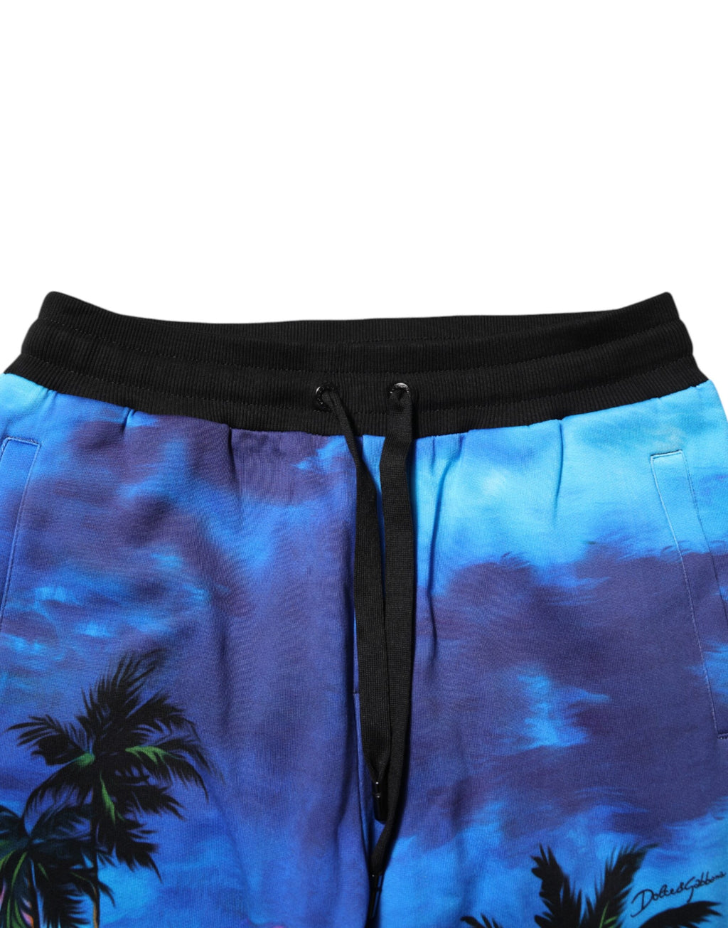 Pantalon jogger Dolce & Gabbana bleu avec motif hawaïen, doux et confortable, en coton avec ceinture élastique.