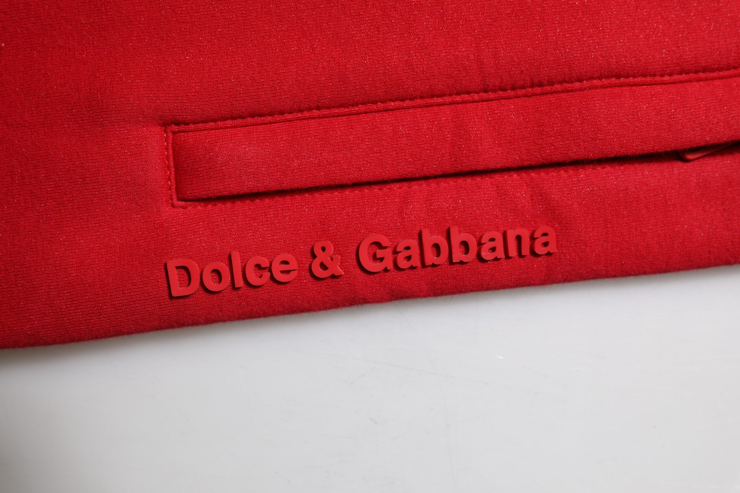 Pantalon de jogging rouge en coton Dolce & Gabbana pour homme avec logo, style décontracté et confortable.