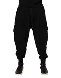 Pantalons joggers Dolce & Gabbana en coton noir avec logo, style décontracté et moderne.