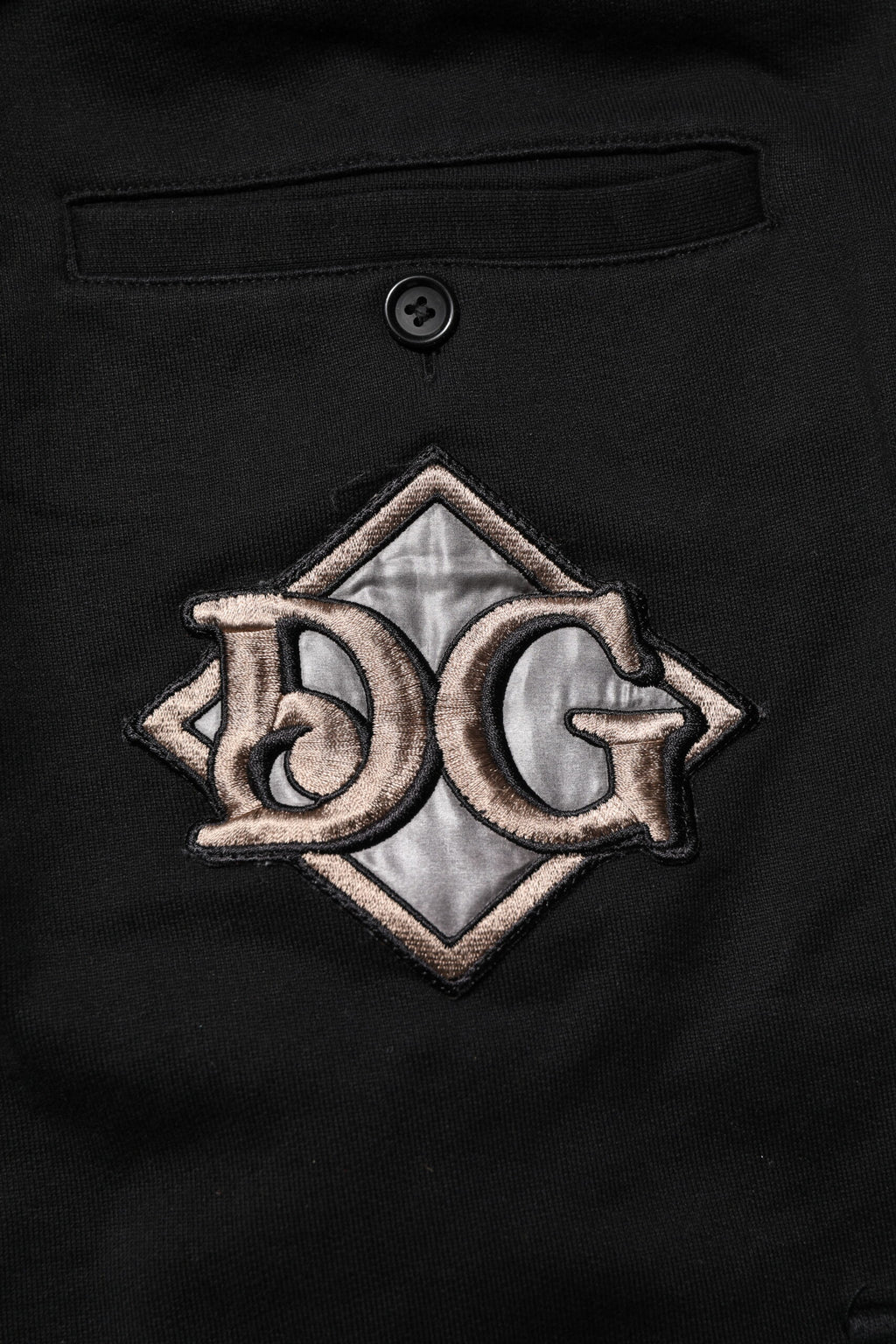 Pantalons joggers Dolce & Gabbana en coton noir avec logo, style décontracté et confortable.
