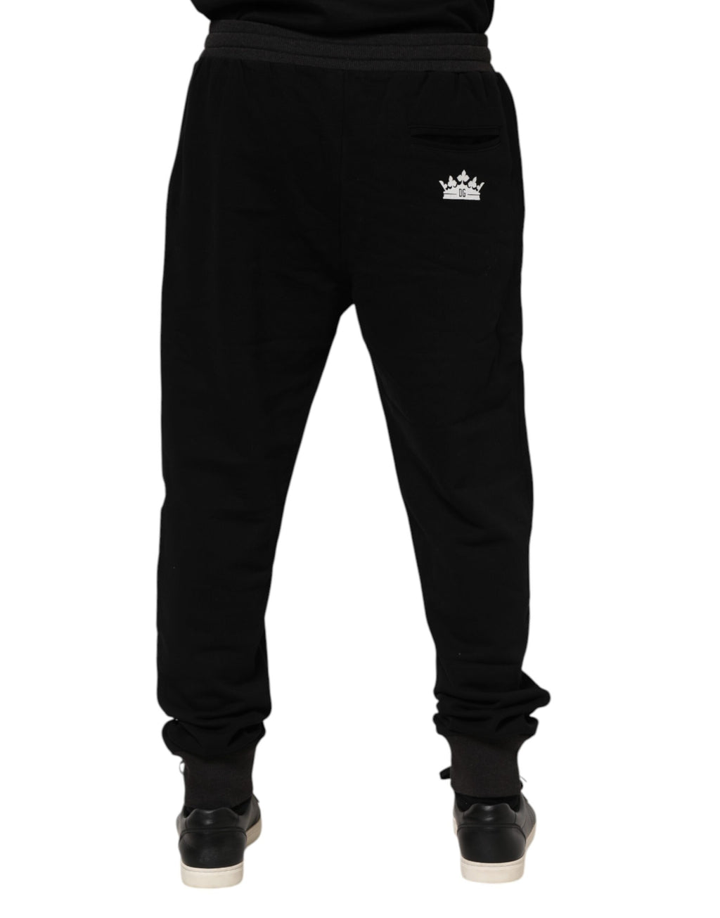 Pantalon jogger Dolce & Gabbana en coton noir avec ceinture en forme de couronne, confort et style élégants.