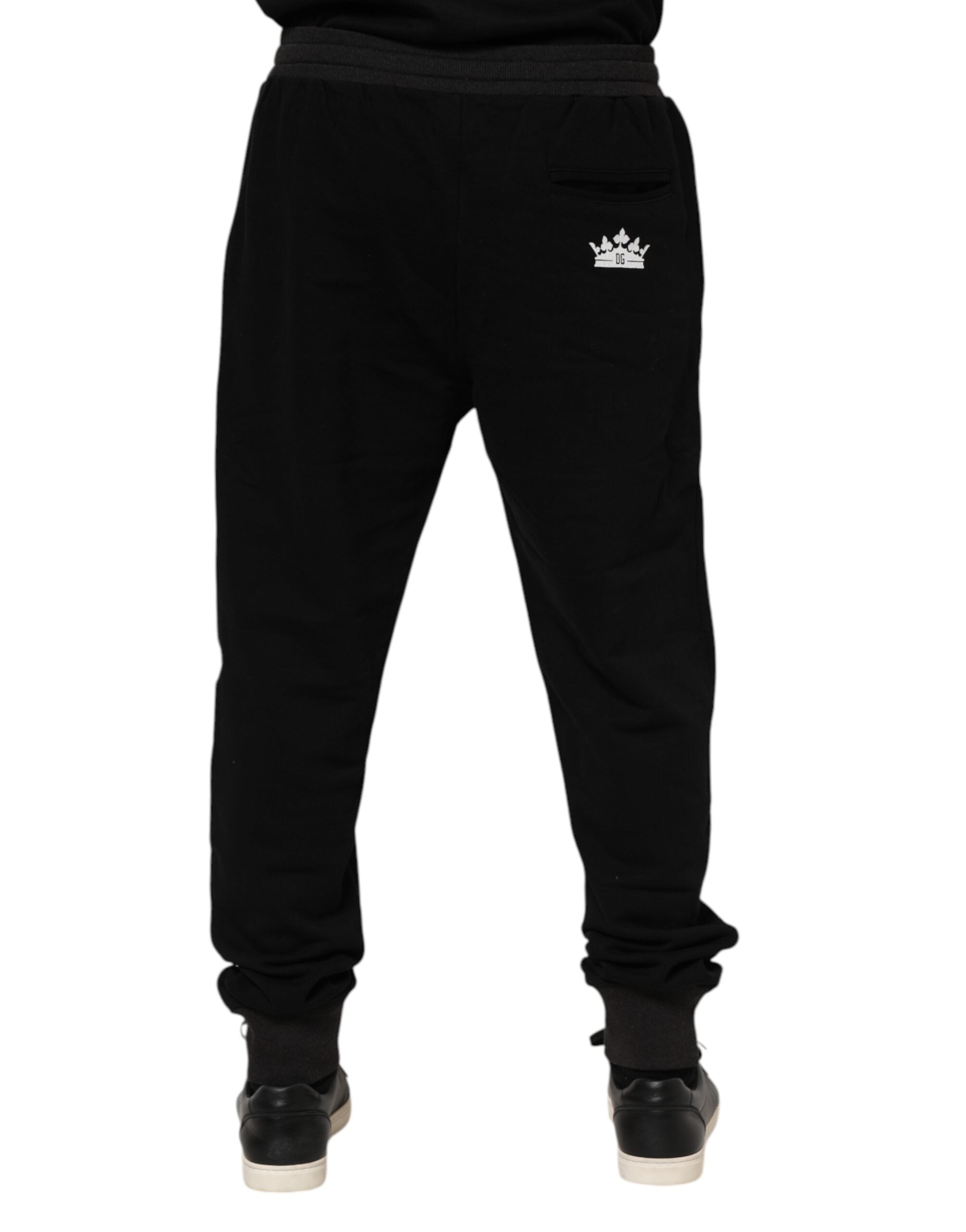 Pantalon jogger Dolce & Gabbana en coton noir avec ceinture en forme de couronne, confort et style élégants.
