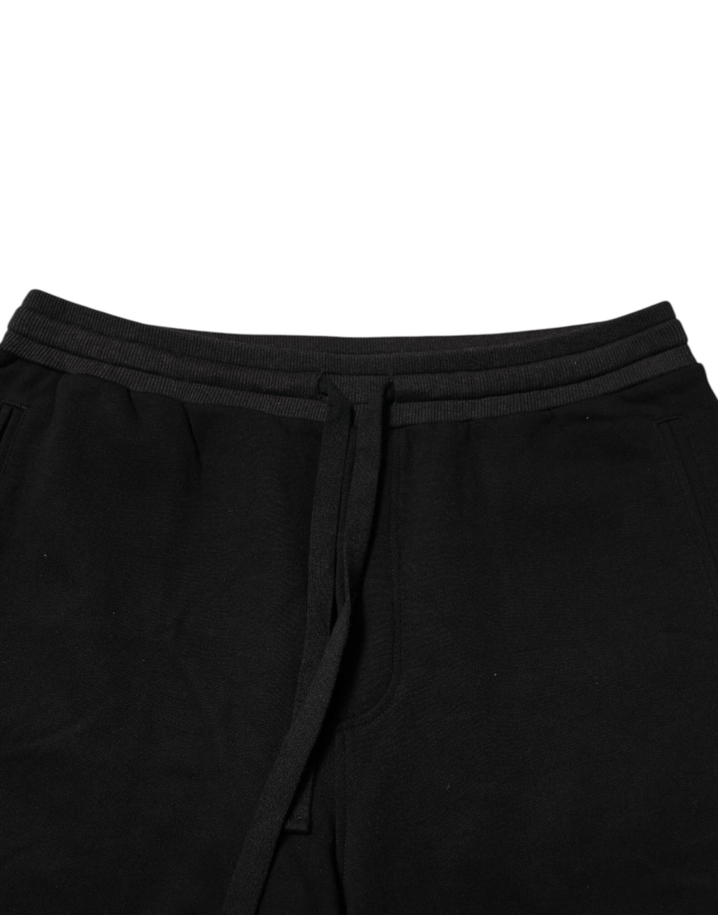 Pantalon de jogging Dolce & Gabbana en coton noir avec ceinture orné d'une couronne, style décontracté et élégant.