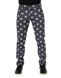 Jeans slim en denim gris foncé Dolce & Gabbana avec logo brodé, coupe skinny, détails de couture.