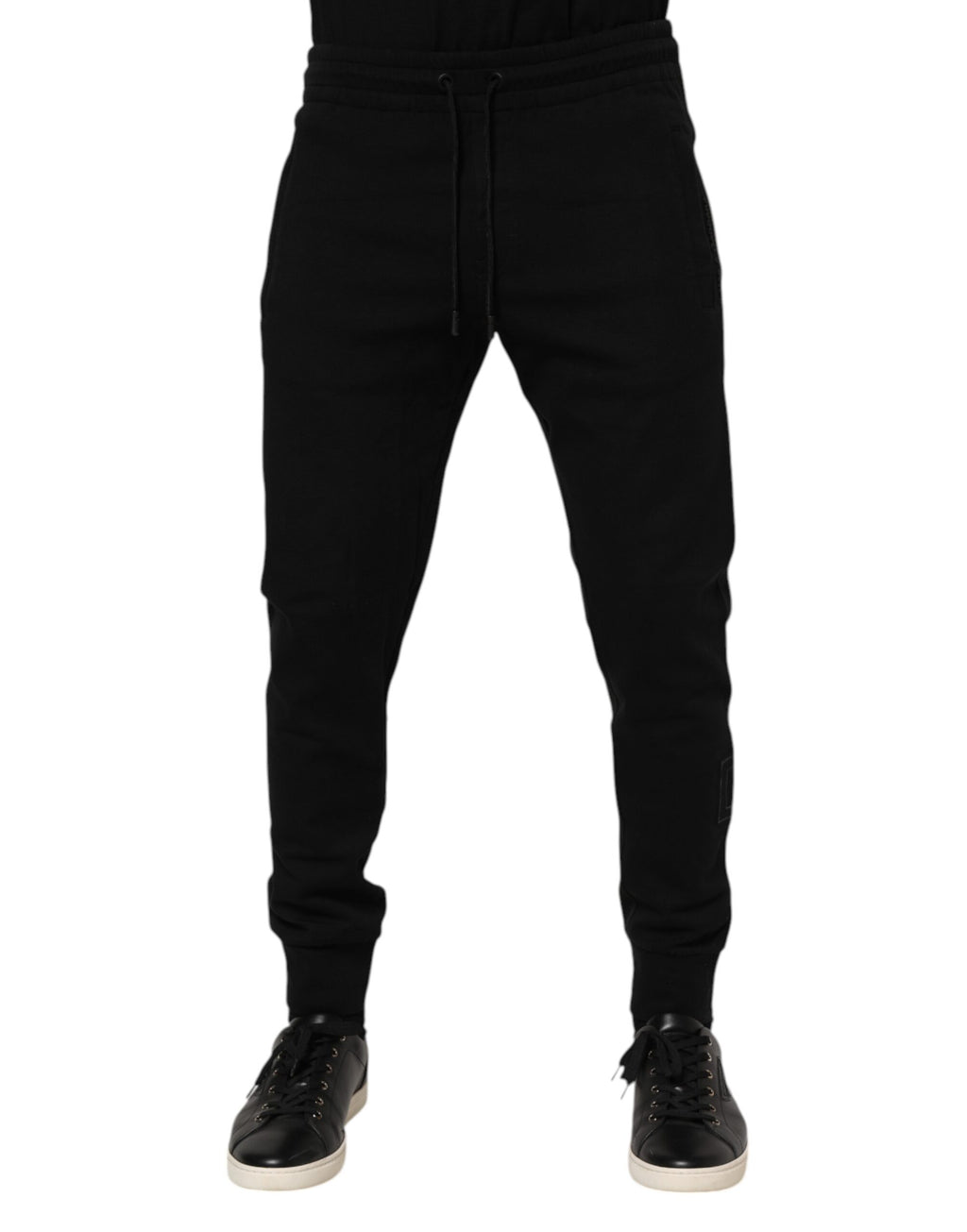 Pantalon de jogging noir pour homme Dolce & Gabbana en coton, coupe décontractée et style élégant.