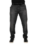 Jeans délavés en coton ample de Dolce & Gabbana, style décontracté et confortable, gris clair, vue de face.