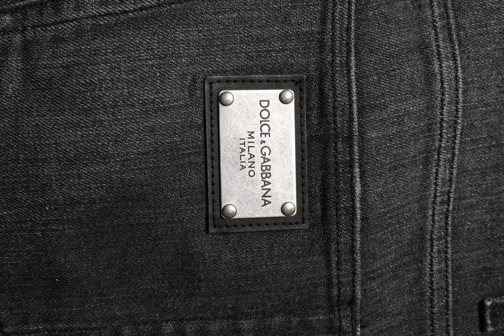 Jeans délavés en coton ample de Dolce & Gabbana, couleur gris, style décontracté et confortable.