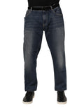 Jeans slim en denim bleu Dolce & Gabbana avec logo en plaque de coton, détails modernes et ajustés.