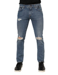 Jeans skinny en denim bleu Dolce & Gabbana avec déchirures et logo, coupe tordue, en coton authentique.