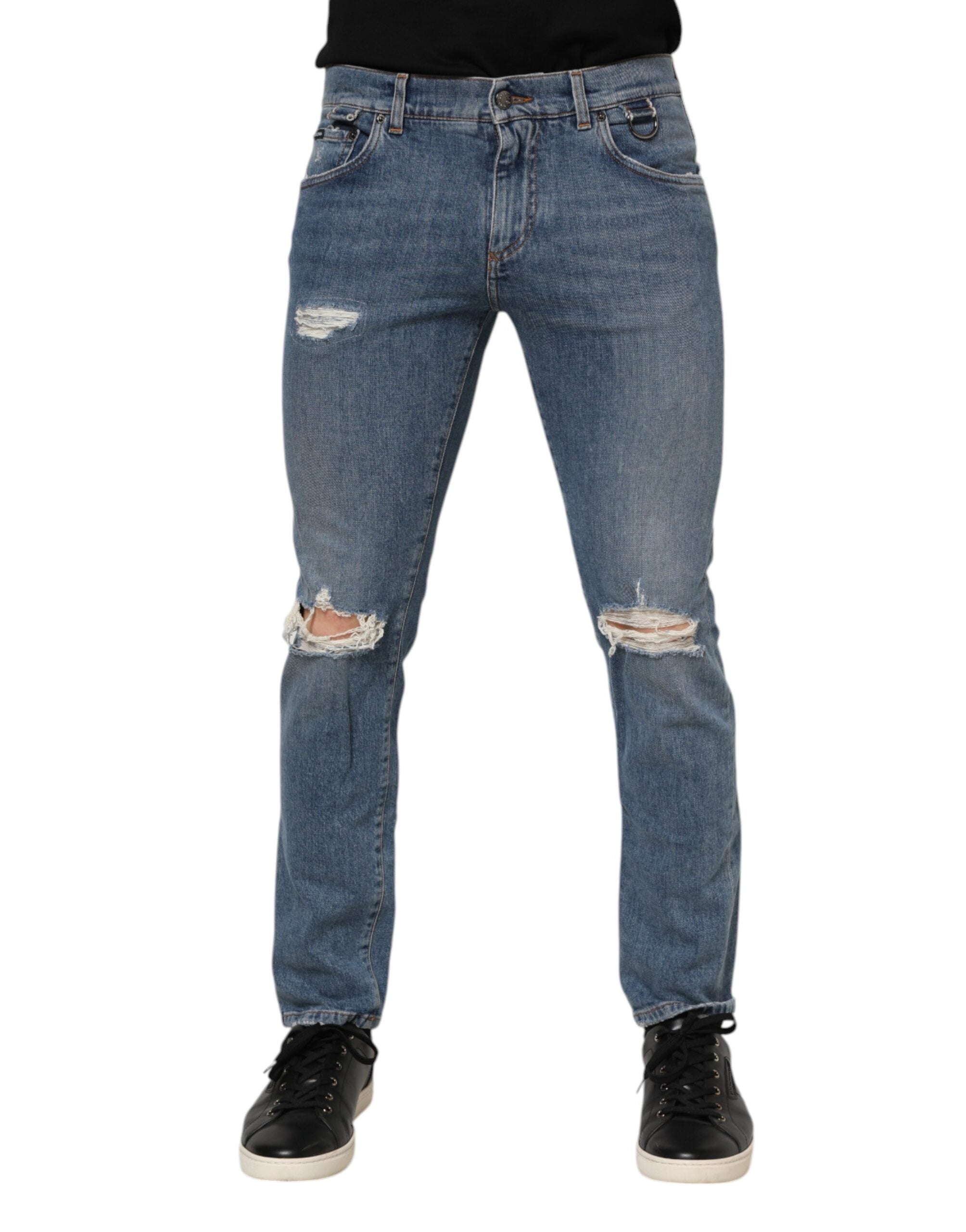 Jeans skinny en denim bleu Dolce & Gabbana avec déchirures et logo, coupe tordue, en coton authentique.