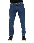 Jean en denim bleu Dolce & Gabbana avec logo en plaque en coton, classique et élégant, visibles détails du tissu et de la finition.