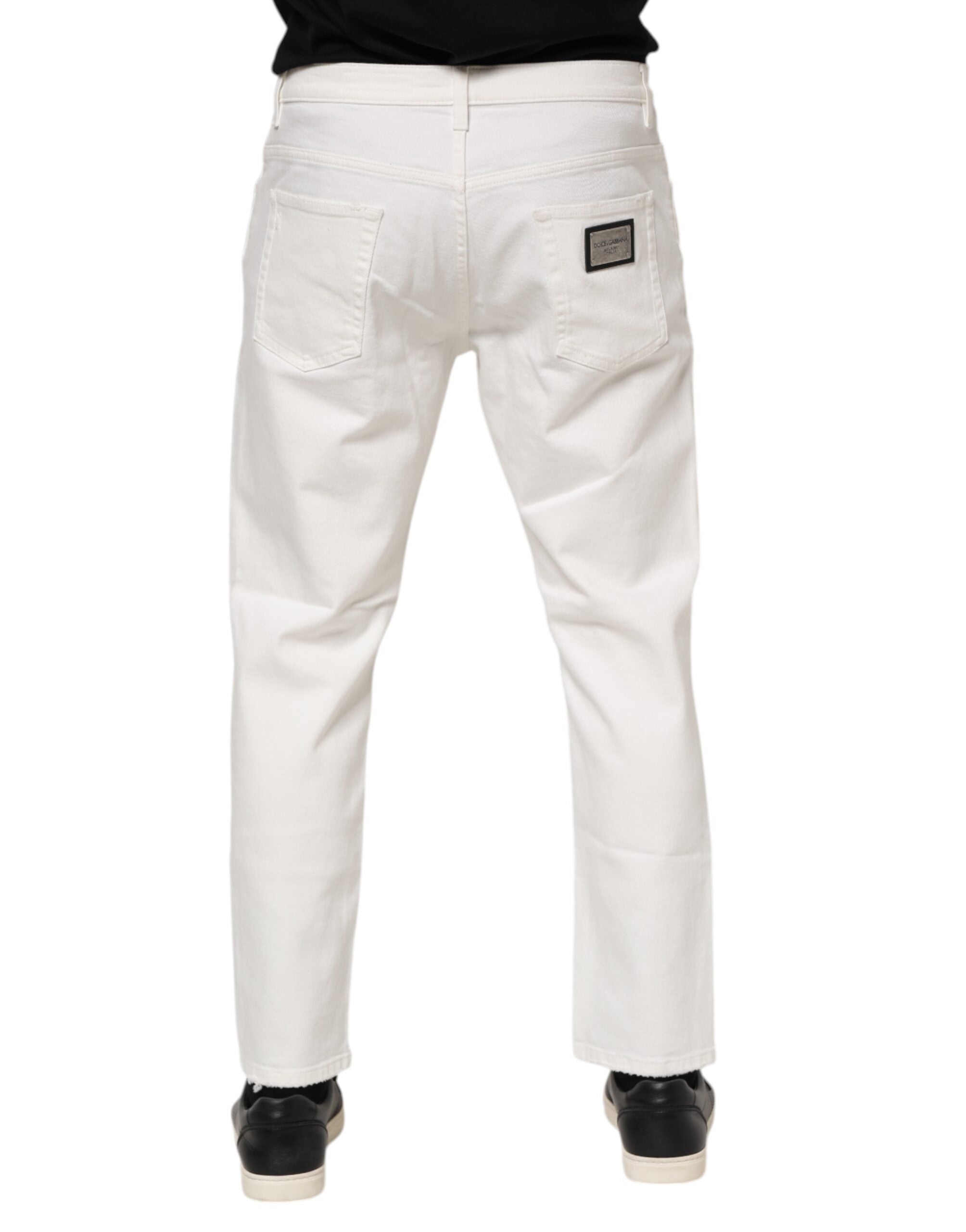 Jean homme en denim blanc Dolce & Gabbana, coupe décontractée en coton, style casual et confortable.