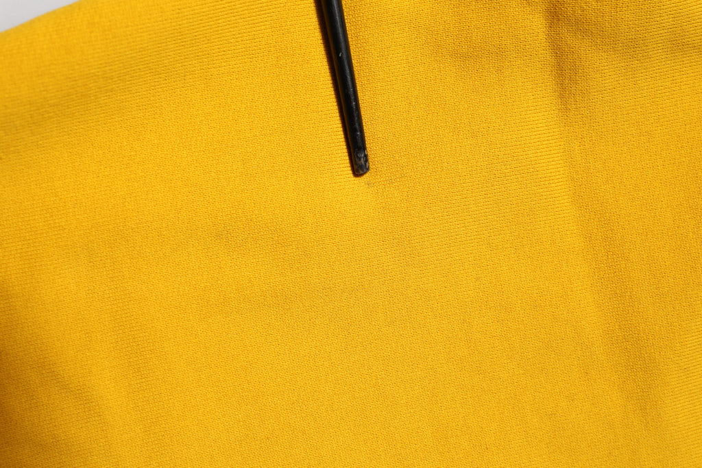 Pantalons de jogging en coton jaune Dolce & Gabbana avec logo, style décontracté et confortable.