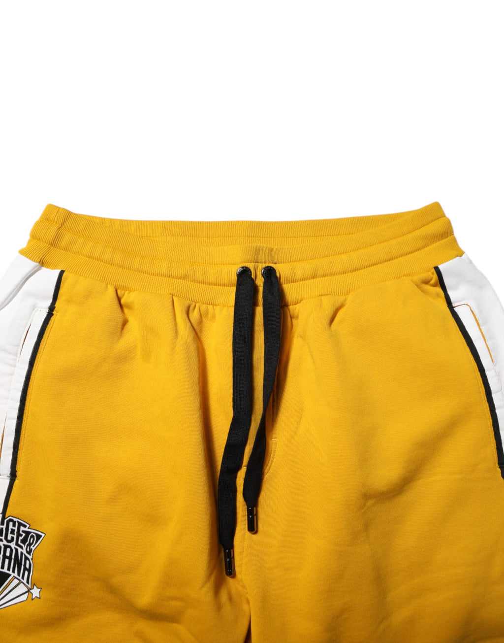 Pantalons de jogging en coton jaune Dolce & Gabbana avec logo et cordon de serrage, coupe décontractée et style élégant.