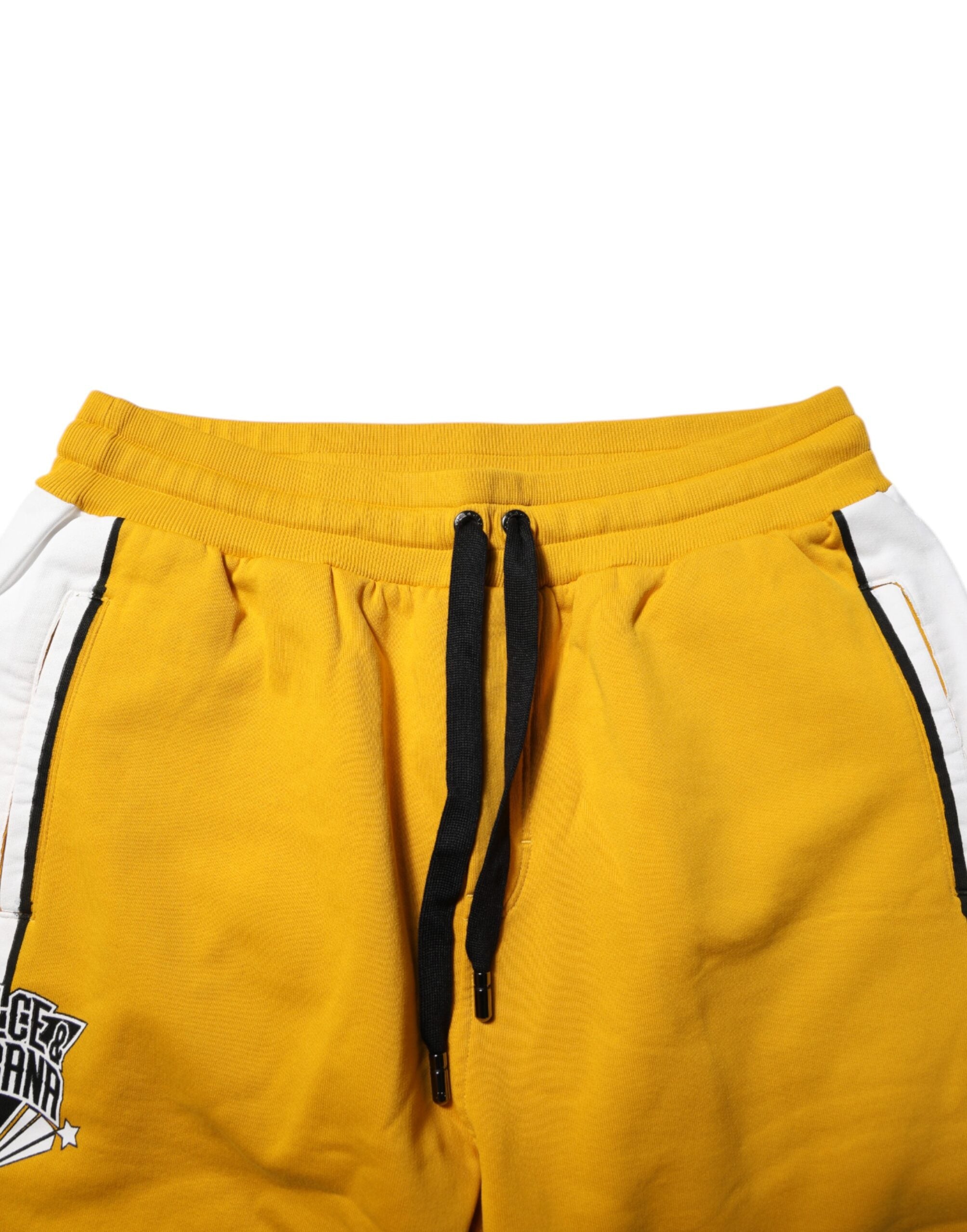 Pantalons de jogging en coton jaune Dolce & Gabbana avec logo et cordon de serrage, coupe décontractée et style élégant.