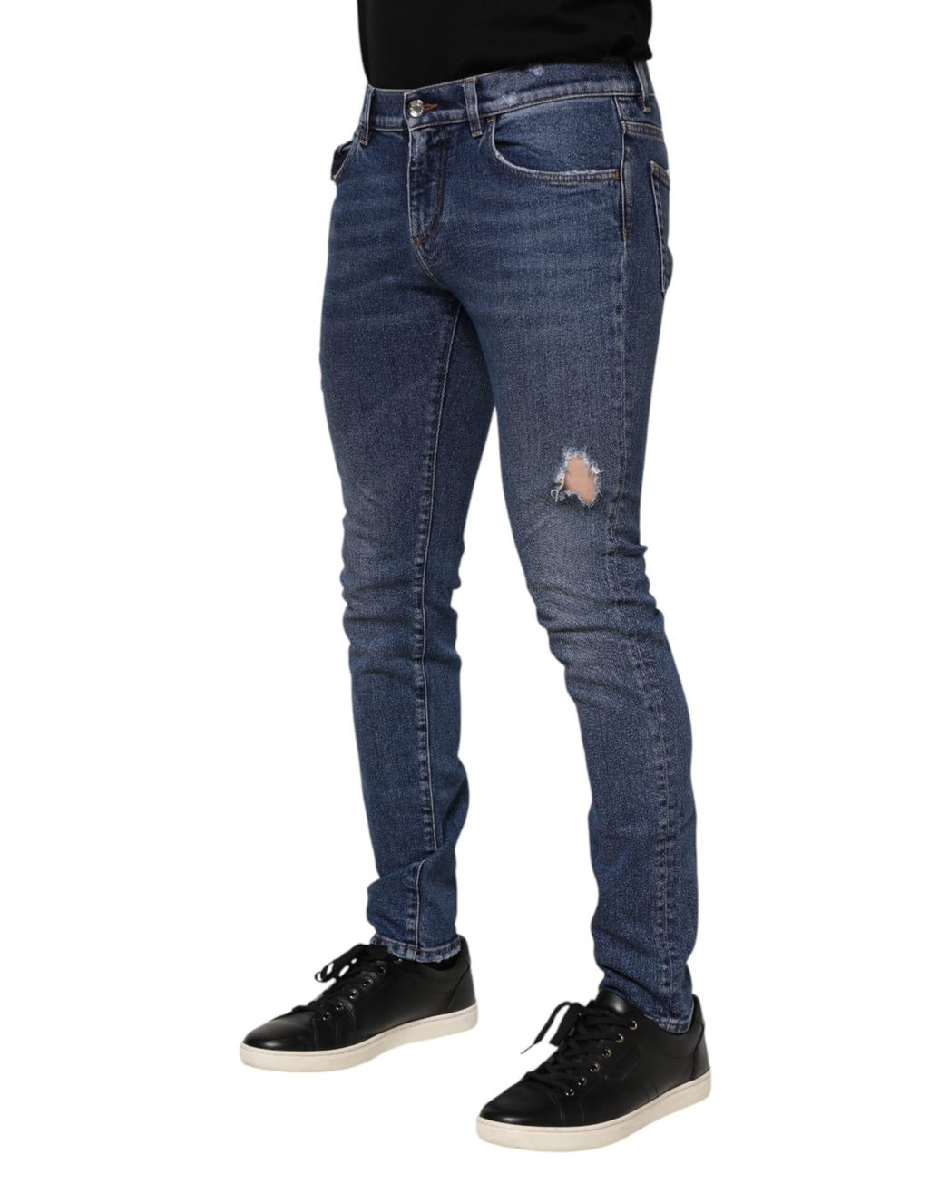 Jeans skinny en denim bleu Dolce & Gabbana avec plaque logo en coton, détails élégants pour homme.