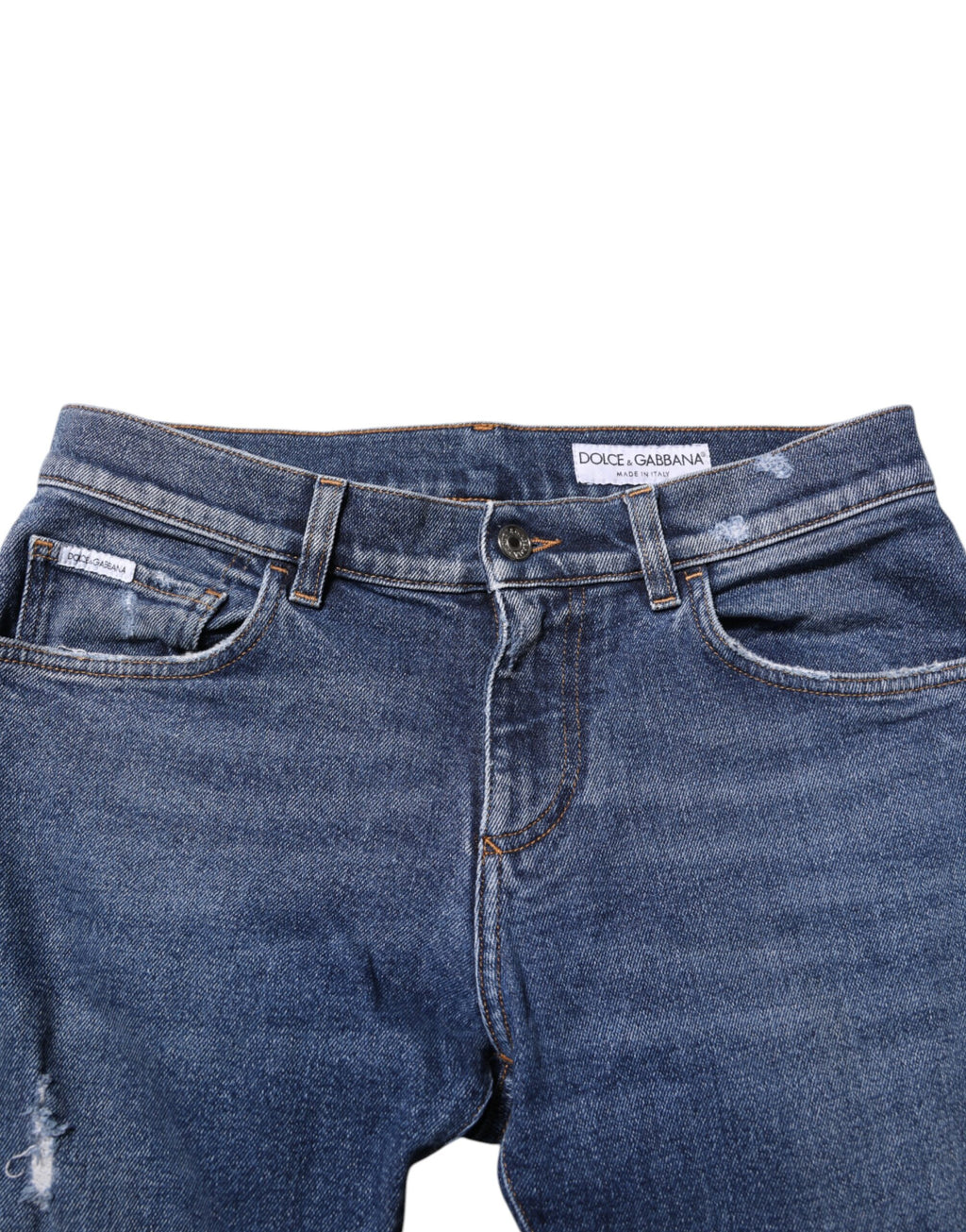 Jeans slim en denim bleu Dolce & Gabbana pour homme avec logo en plaque en coton, style tendance et ajusté.
