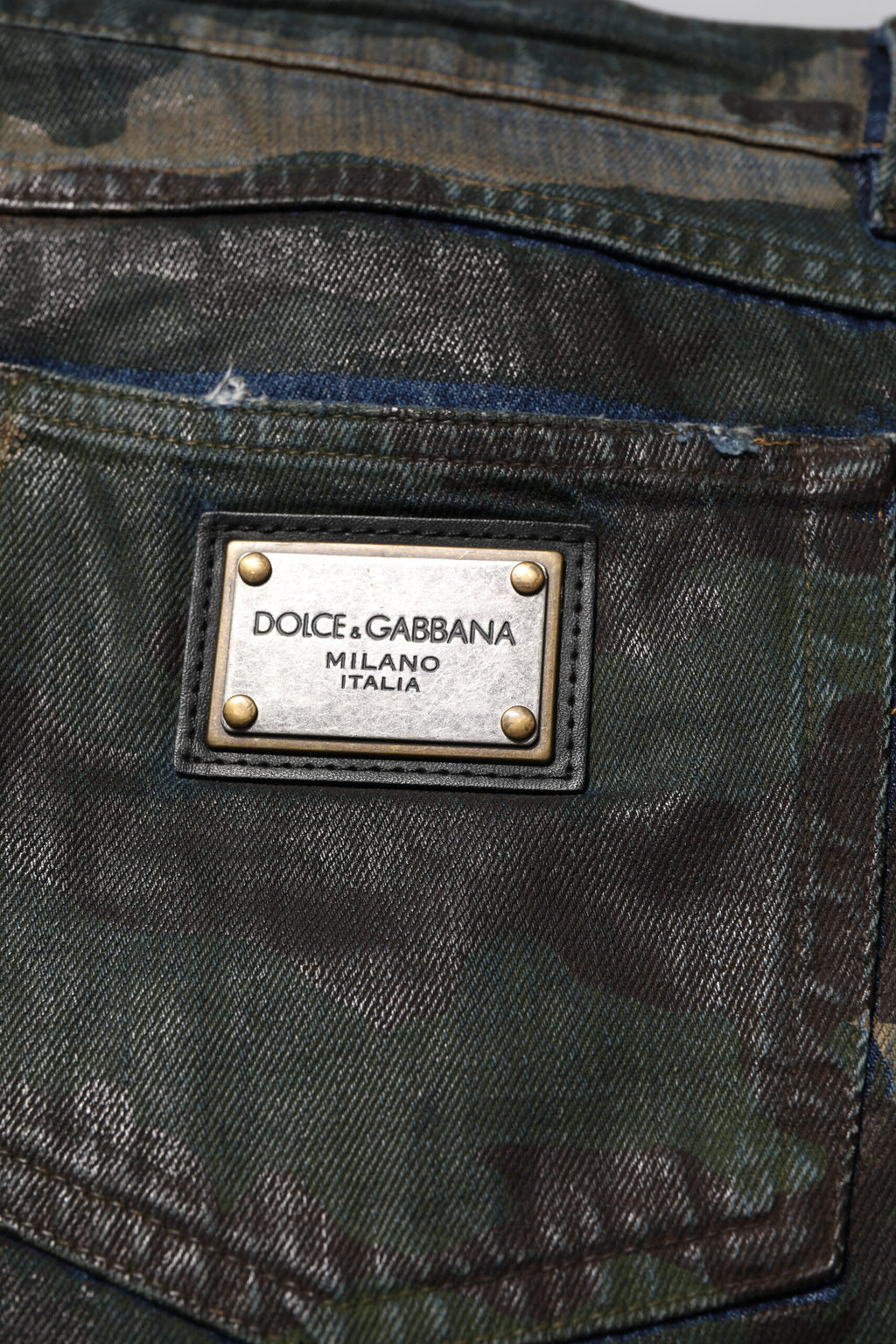 Jeans en denim camouflage bleu Dolce & Gabbana en coton avec détails de style moderne.