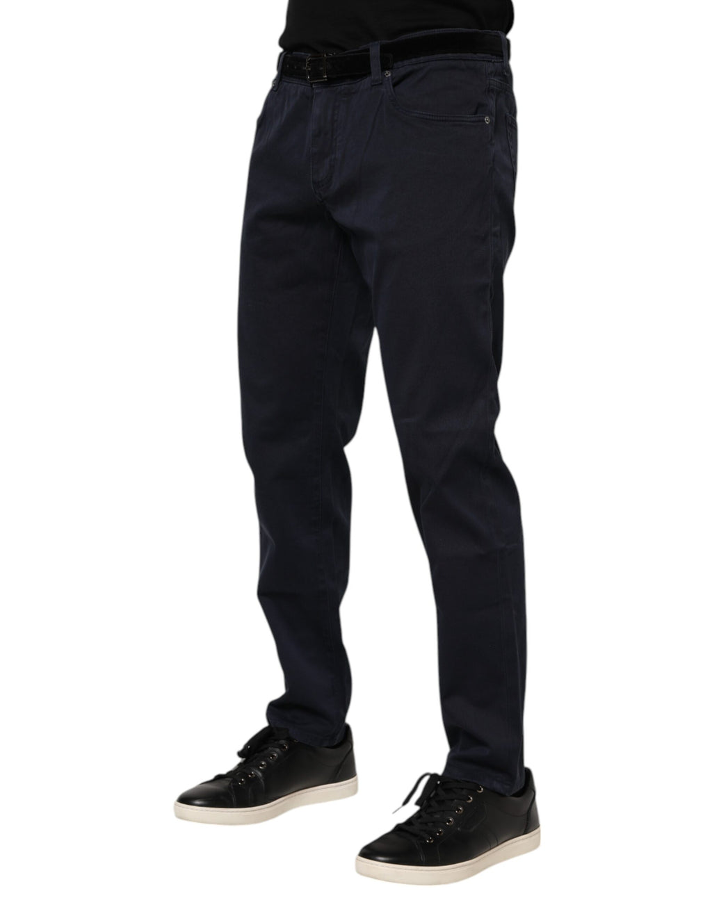 Jeans en denim bleu Dolce & Gabbana, coupe tapered, en coton, visible avec détails de couture et fermeture éclair.
