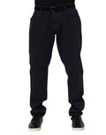 Jeans en denim noir Dolce & Gabbana, coupe tapered, en coton avec détails classiques, porté sur mannequin.