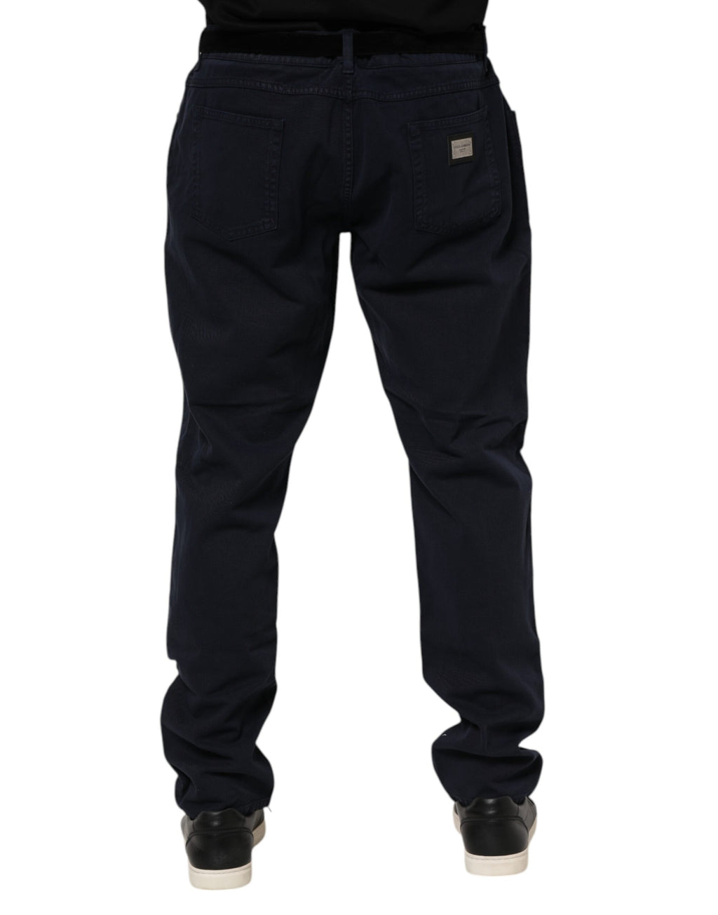 Jeans en coton noir Dolce & Gabbana, coupe tapered, denim avec détails modernes visibles sur l'image.