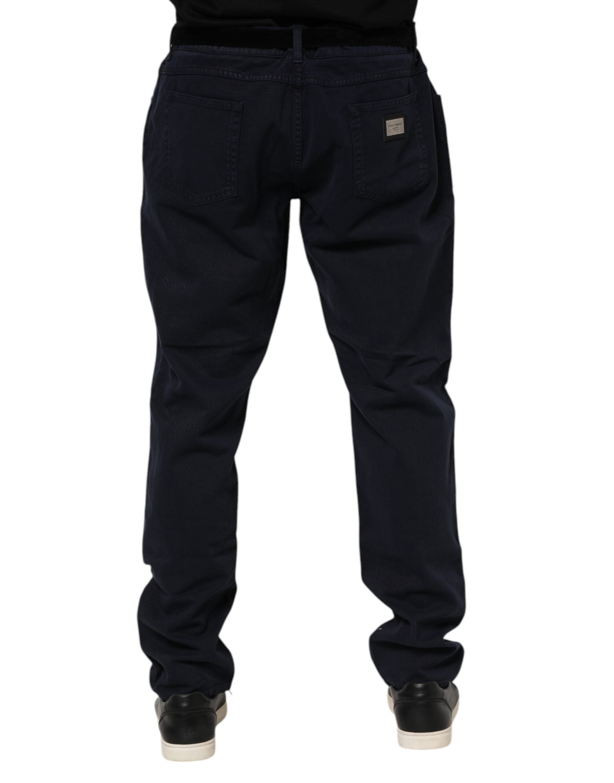 Jeans en coton noir Dolce & Gabbana, coupe tapered, denim avec détails modernes visibles sur l'image.