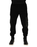 Pantalons jogger pour hommes Dolce & Gabbana en coton noir avec poches cargo, style décontracté et élégant.