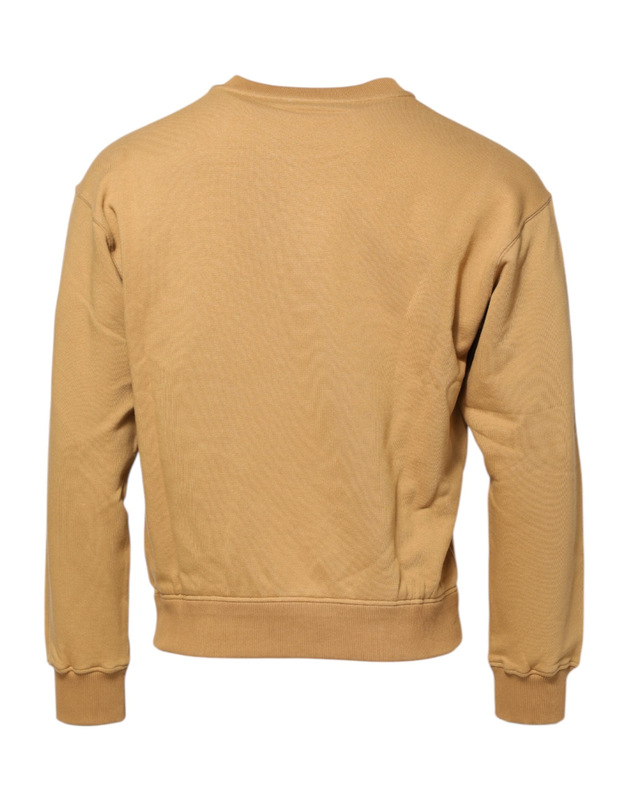 Pull en coton moutarde Dolce & Gabbana avec motif embossé, doux et confortable, porté sur un mannequin.