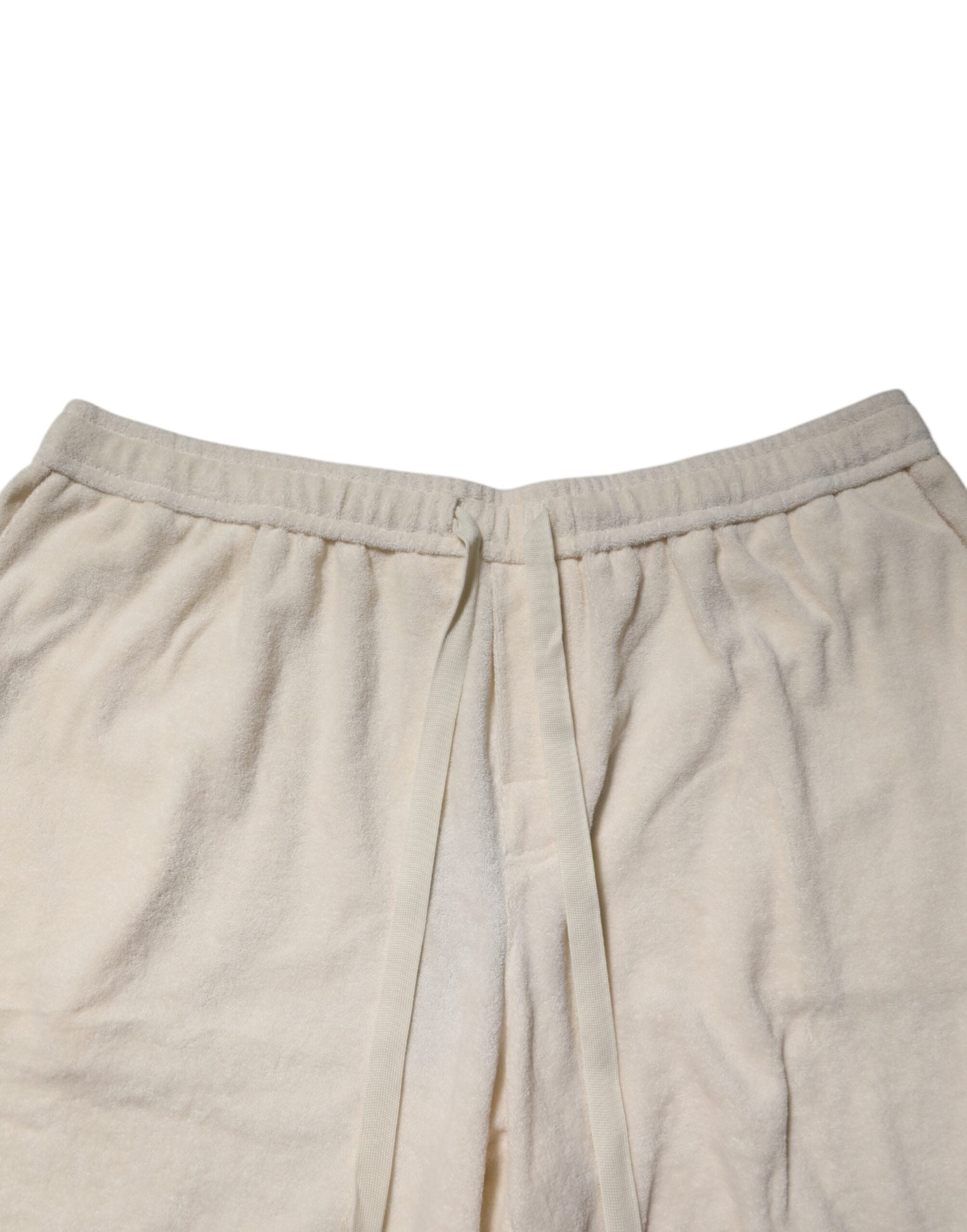 Shorts bermuda en coton ivoire de Dolce & Gabbana pour homme, sweatshorts élégants et confortables.