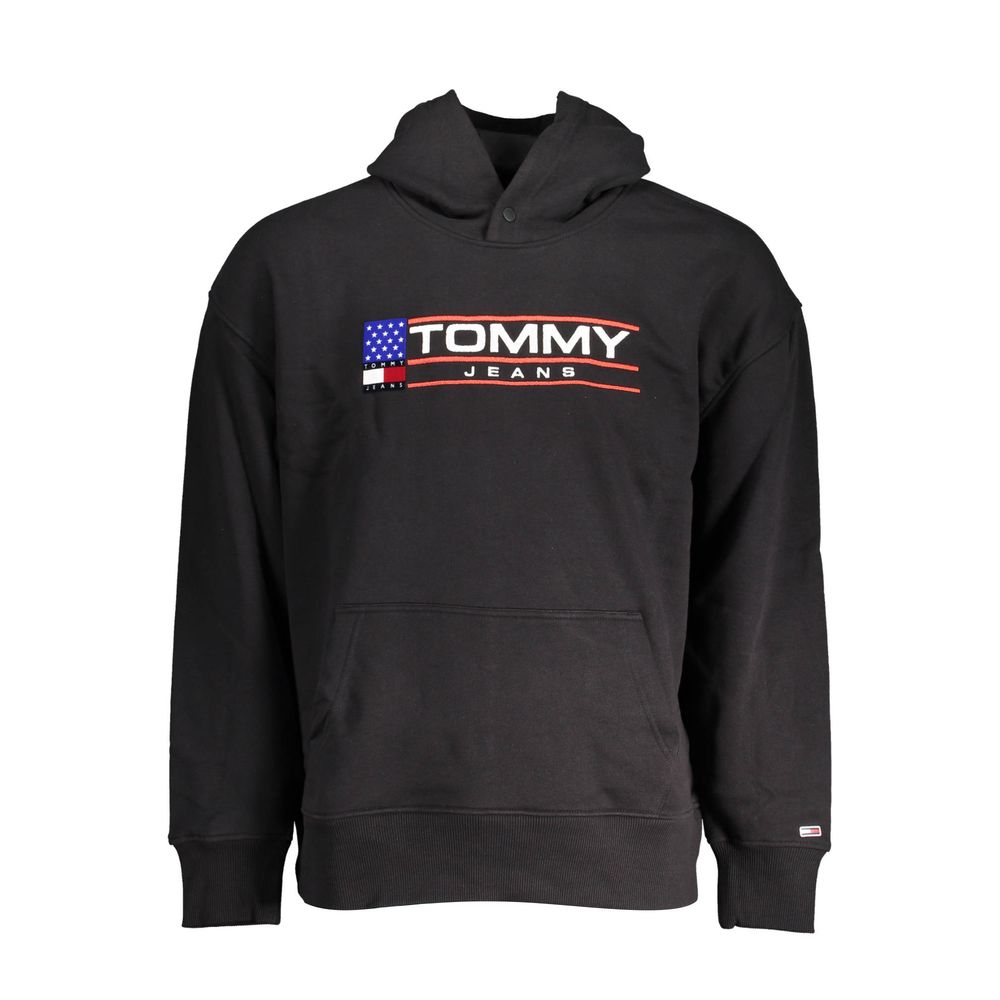 Pull homme en coton noir Tommy Hilfiger, col rond et logo discret, porté sur un mannequin.