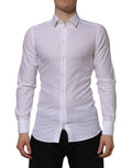 Chemise formelle en coton blanc Dolce & Gabbana avec manches longues et détails en or.