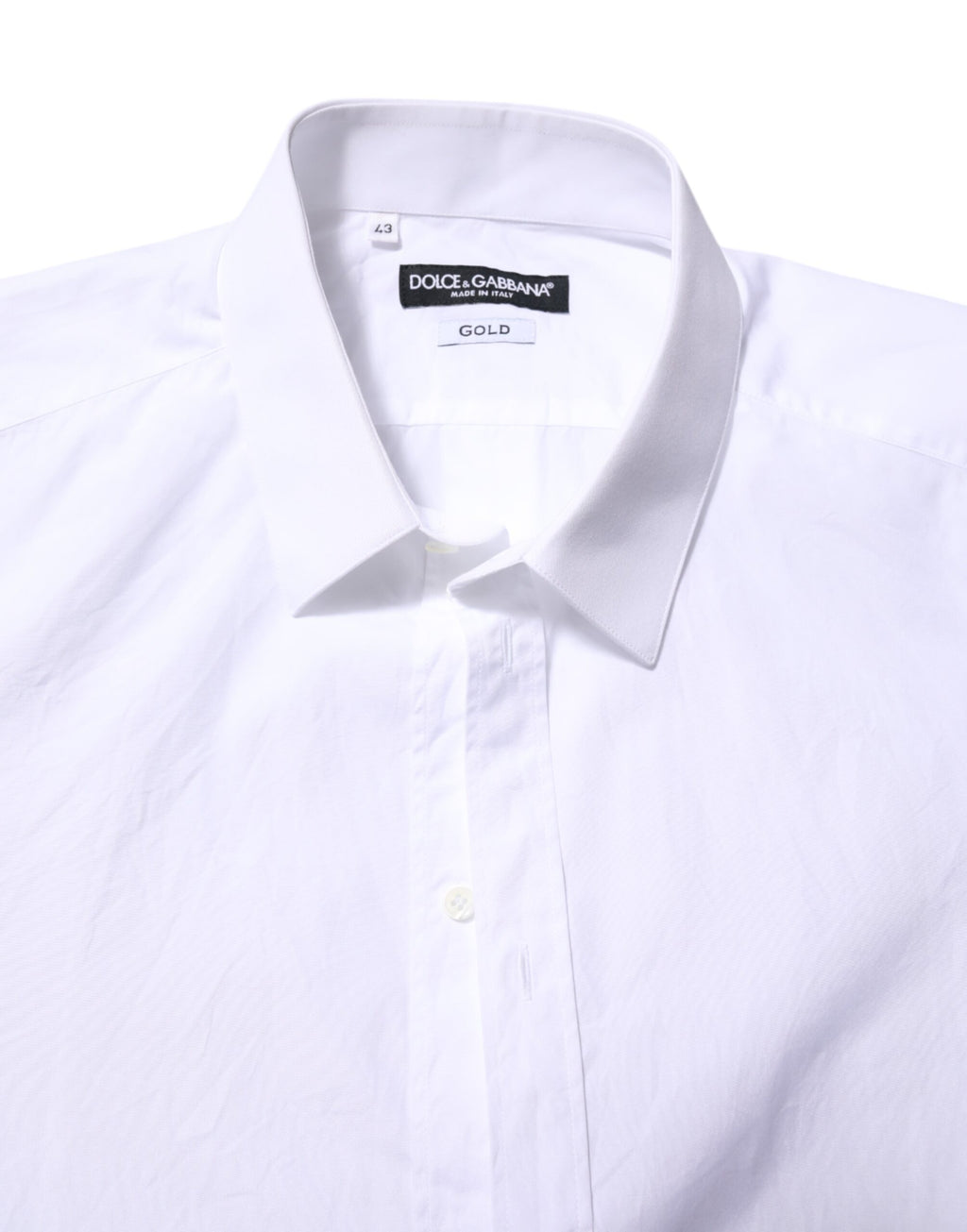 Chemise blanche en coton Dolce & Gabbana à manches longues, style formel avec détails dorés élégants.