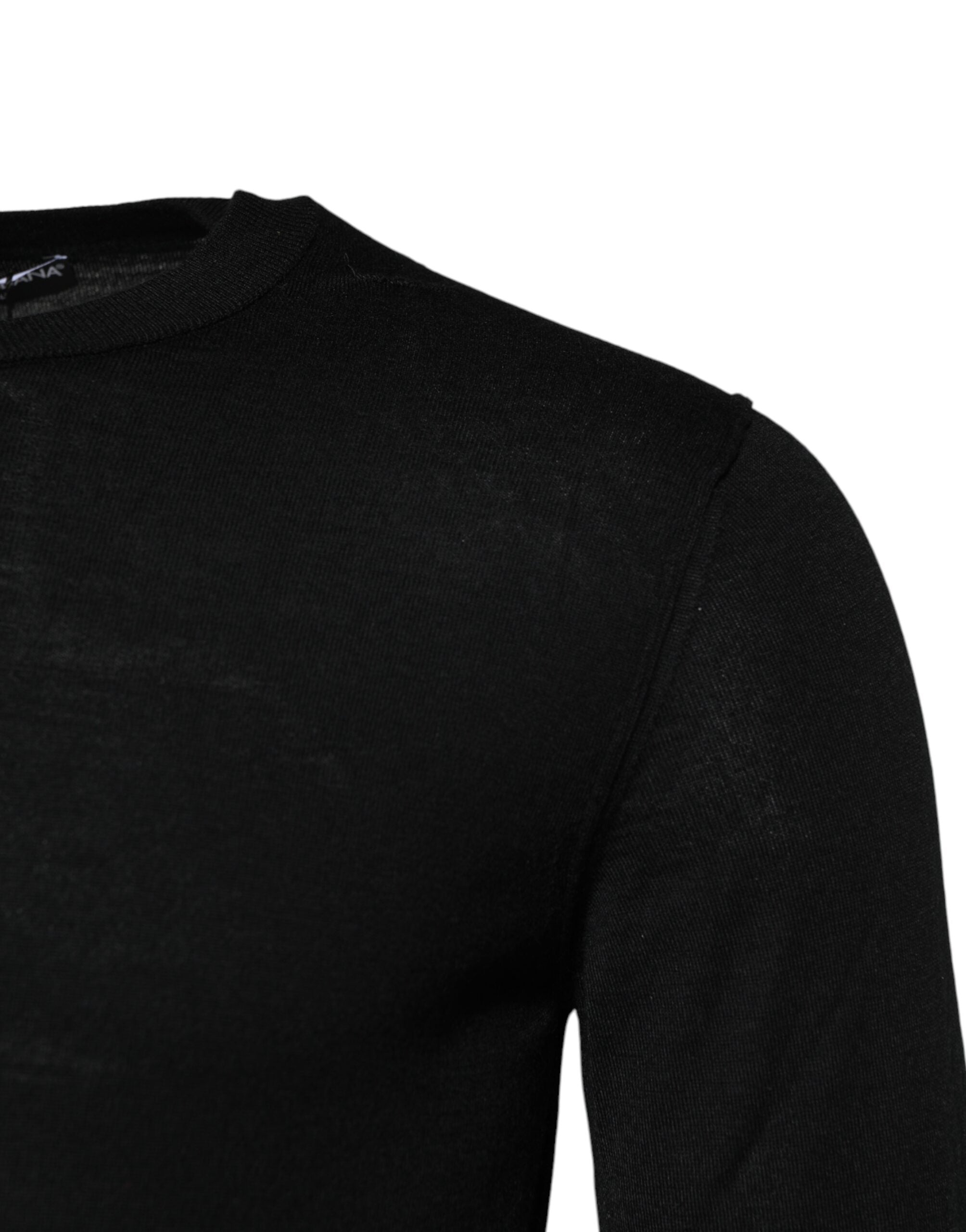 T-shirt à manches longues en cachemire noir Dolce & Gabbana avec col rond, élégant et confortable.